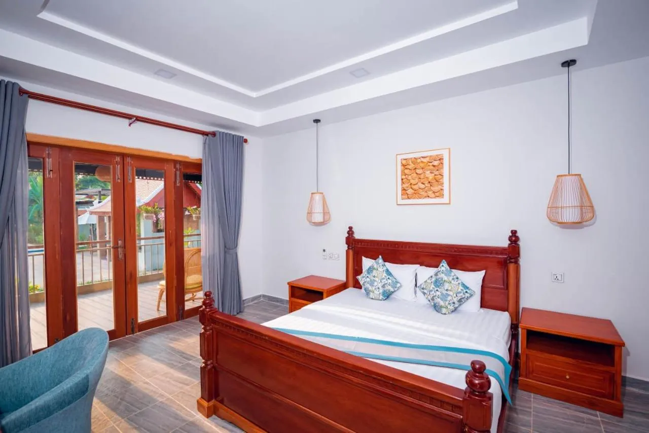 Bed in Ganesha Kampot Resort