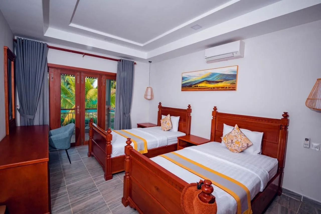 Bed in Ganesha Kampot Resort