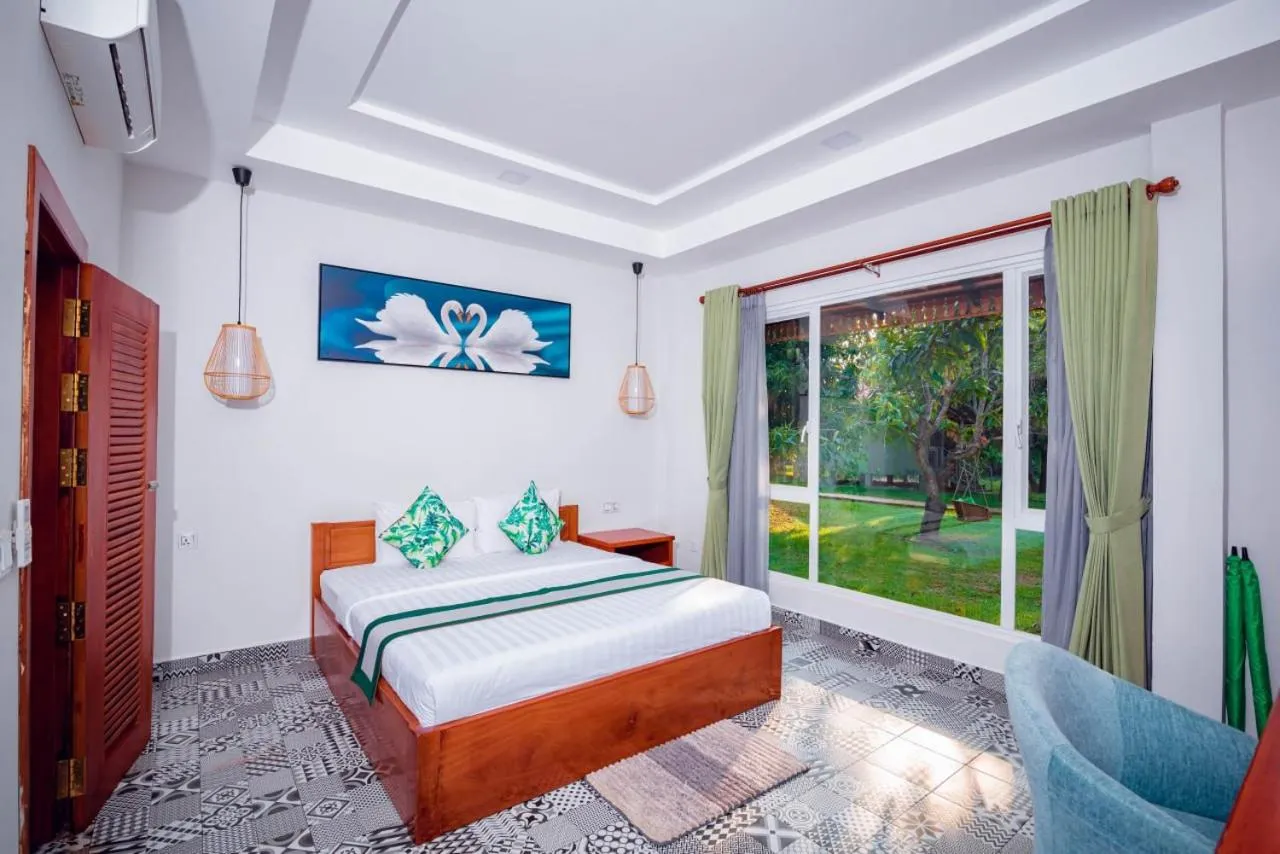 Bed in Ganesha Kampot Resort