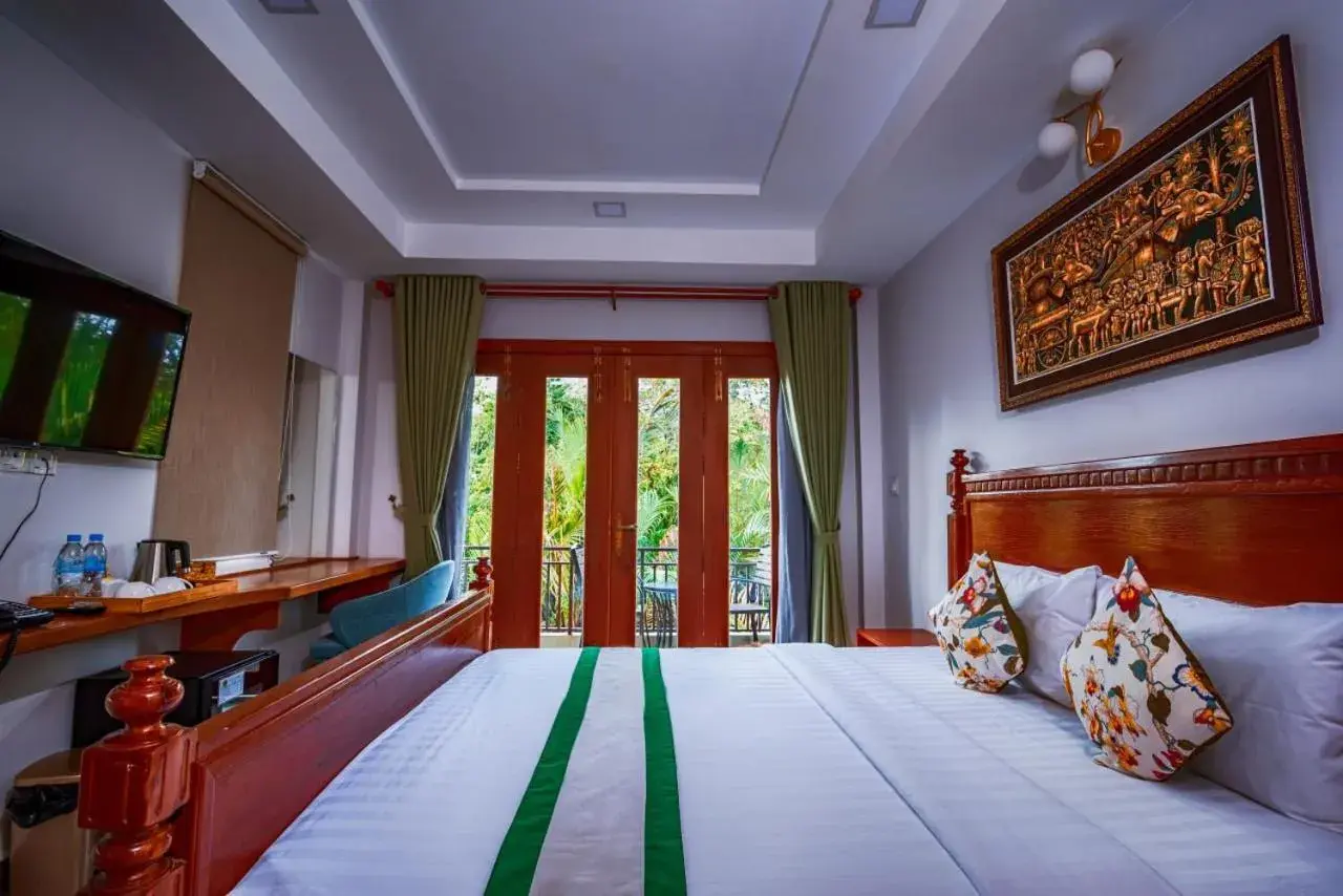 Bed in Ganesha Kampot Resort Bed in Ganesha Kampot Resort