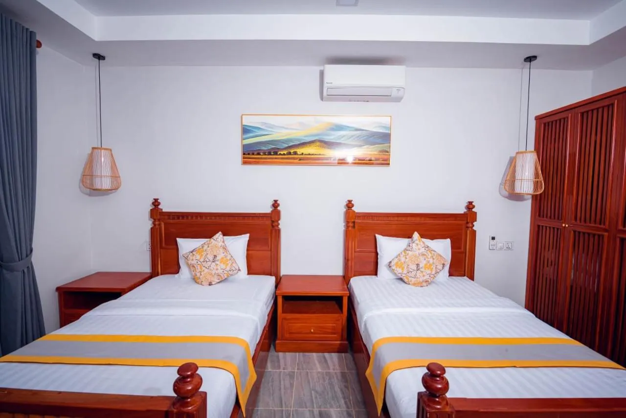 Bed in Ganesha Kampot Resort