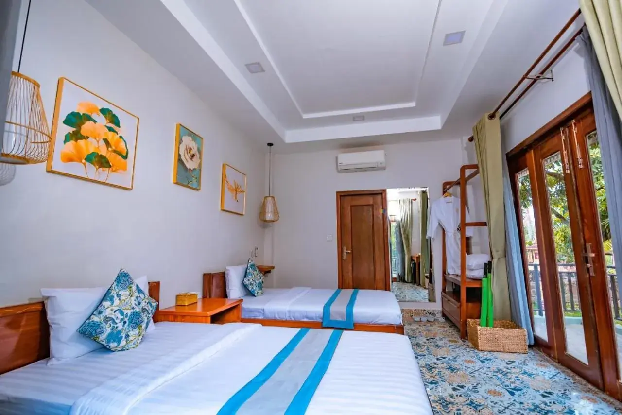 Bed in Ganesha Kampot Resort Bed in Ganesha Kampot Resort