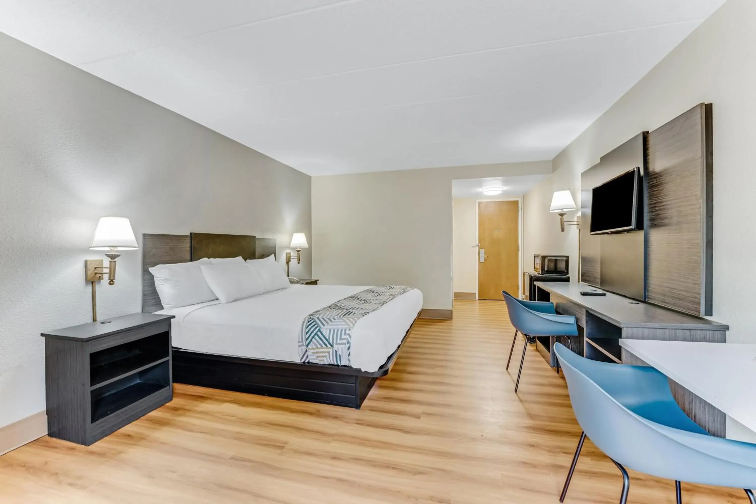 Bed in Red Carpet Inn & Suites Bed in Red Carpet Inn & Suites