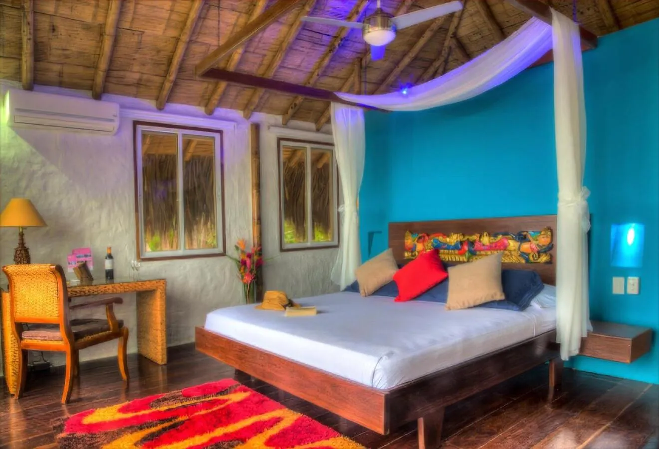 Bed in Villa Maria Tayrona, Jungle and Sea Experience