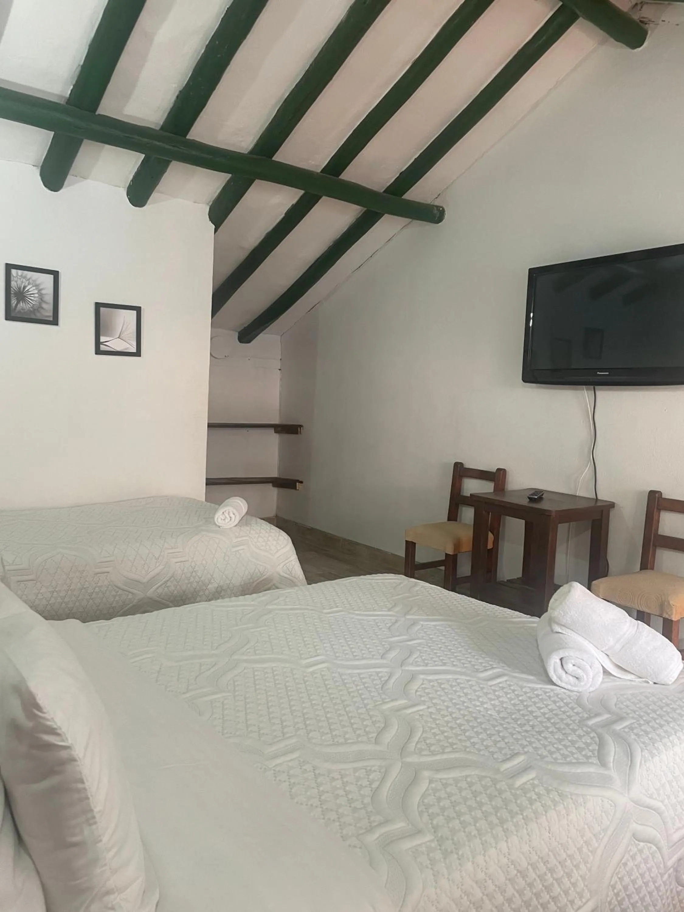 Photo of the whole room, Bed in Celeste Villa de Leyva
