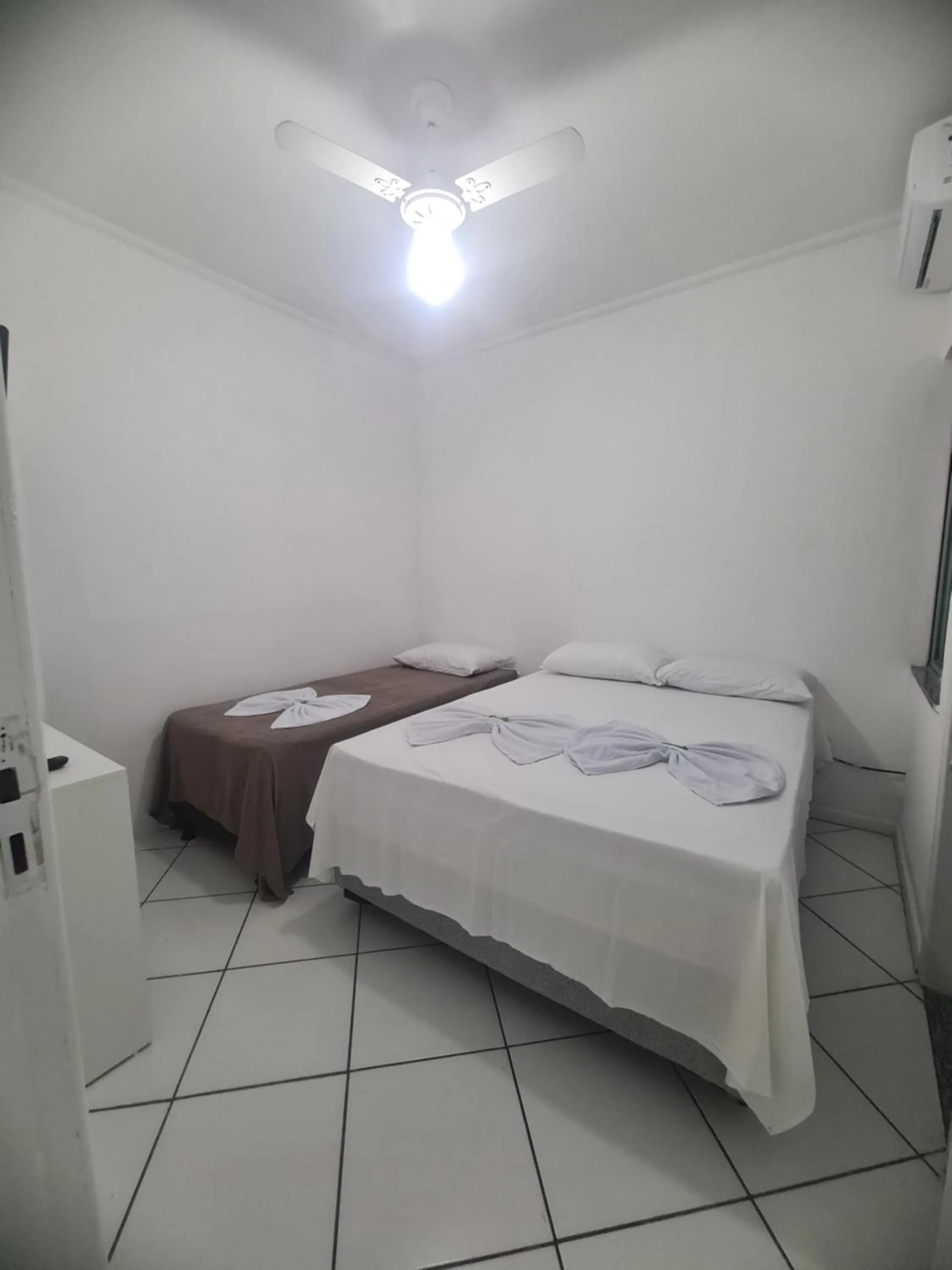 Bed in Hotel Aconchegante