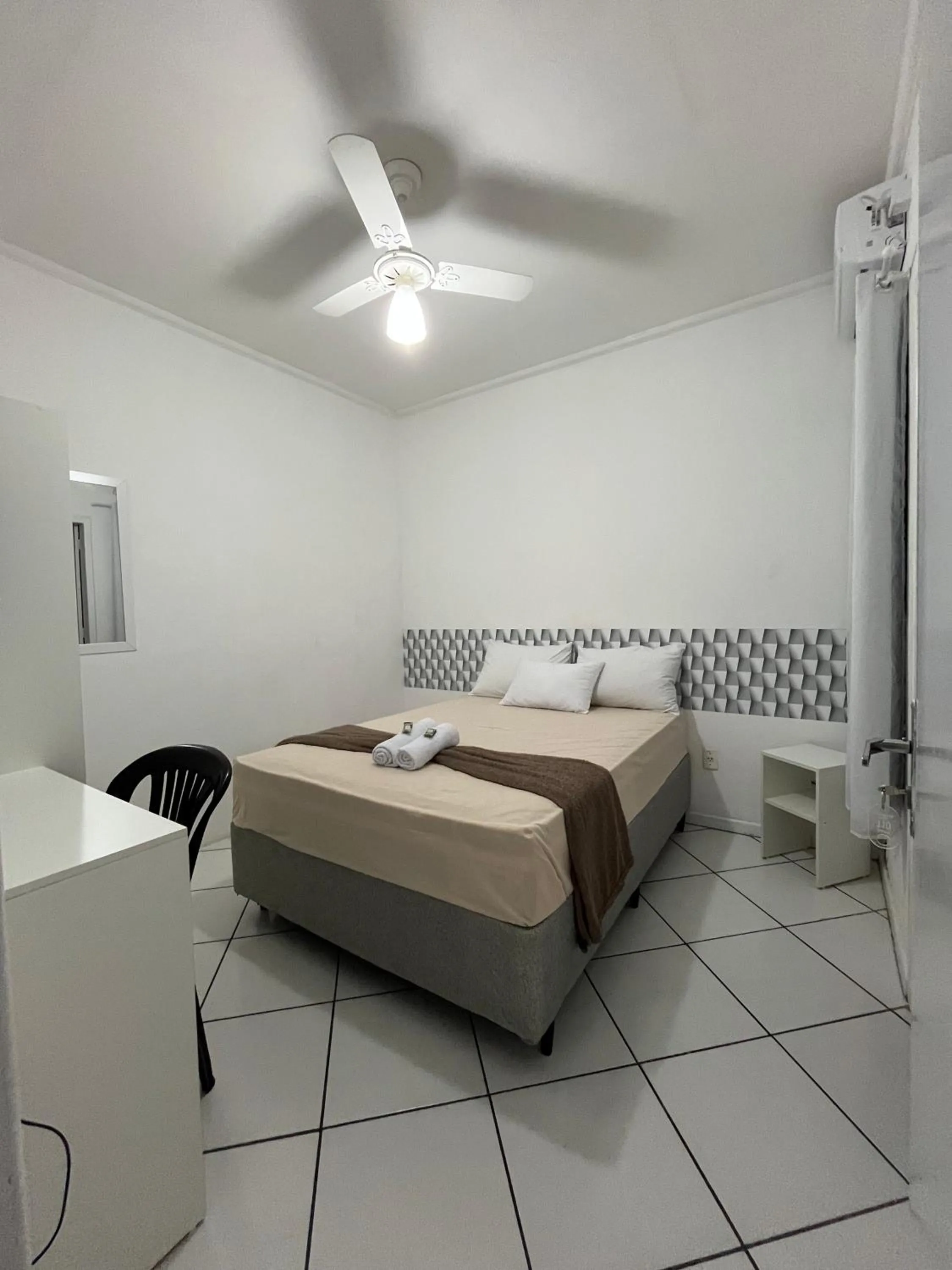 Bed in Hotel Aconchegante