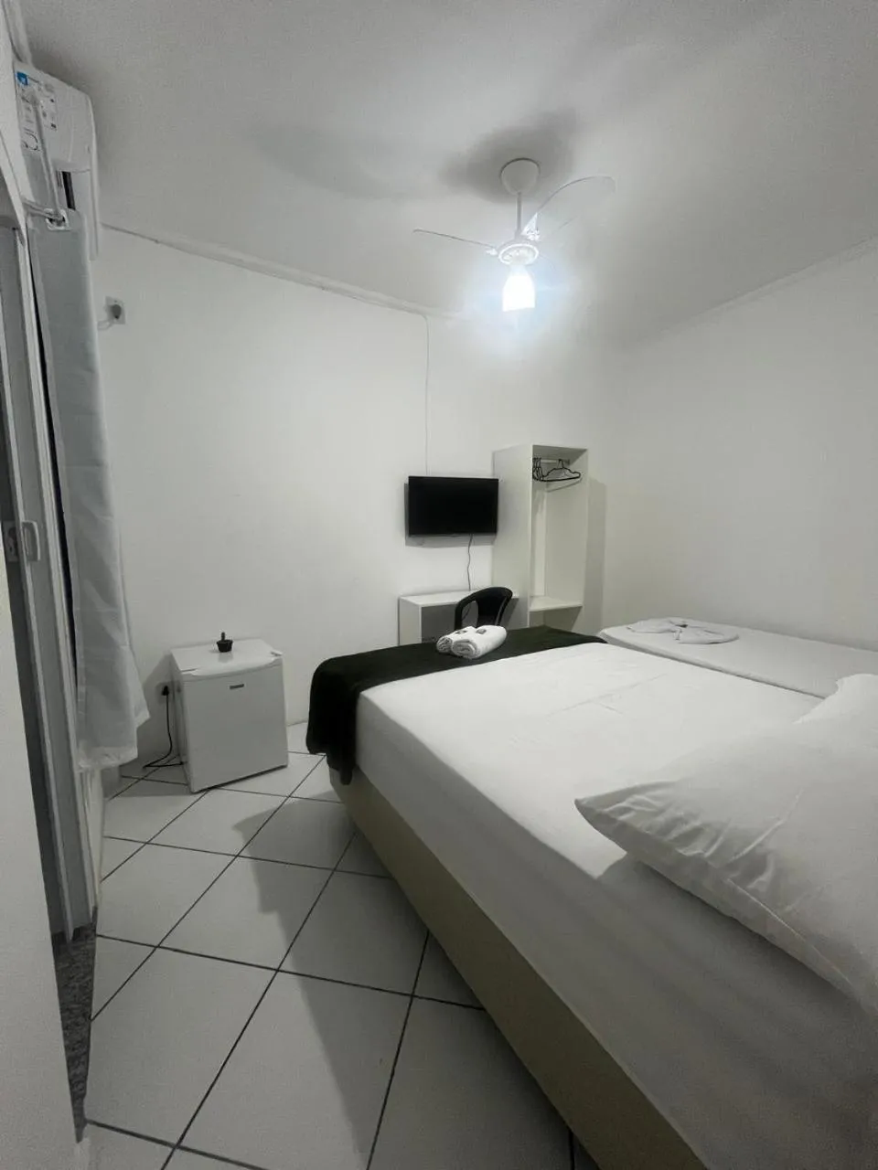 Bed in Hotel Aconchegante