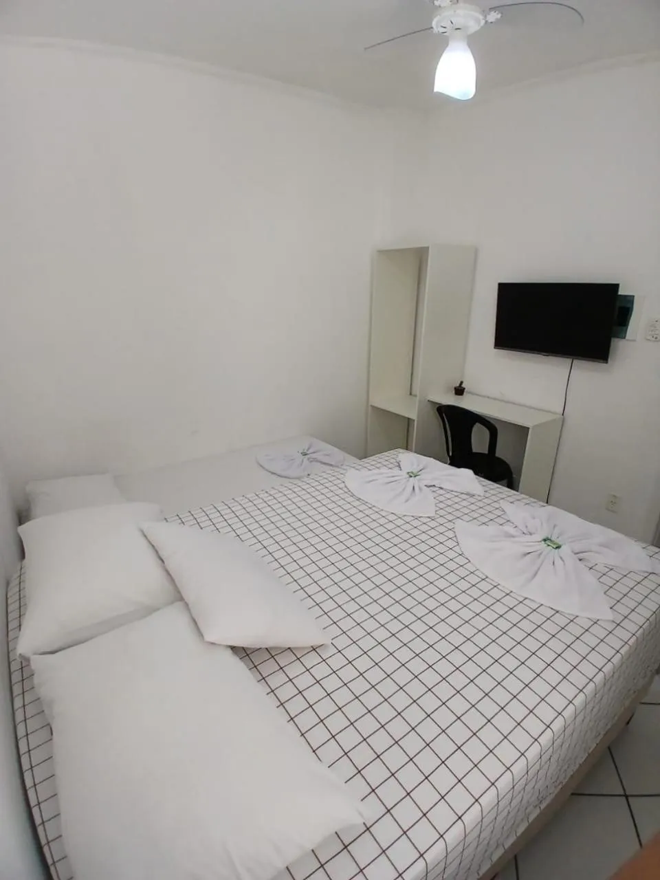 Bed in Hotel Aconchegante
