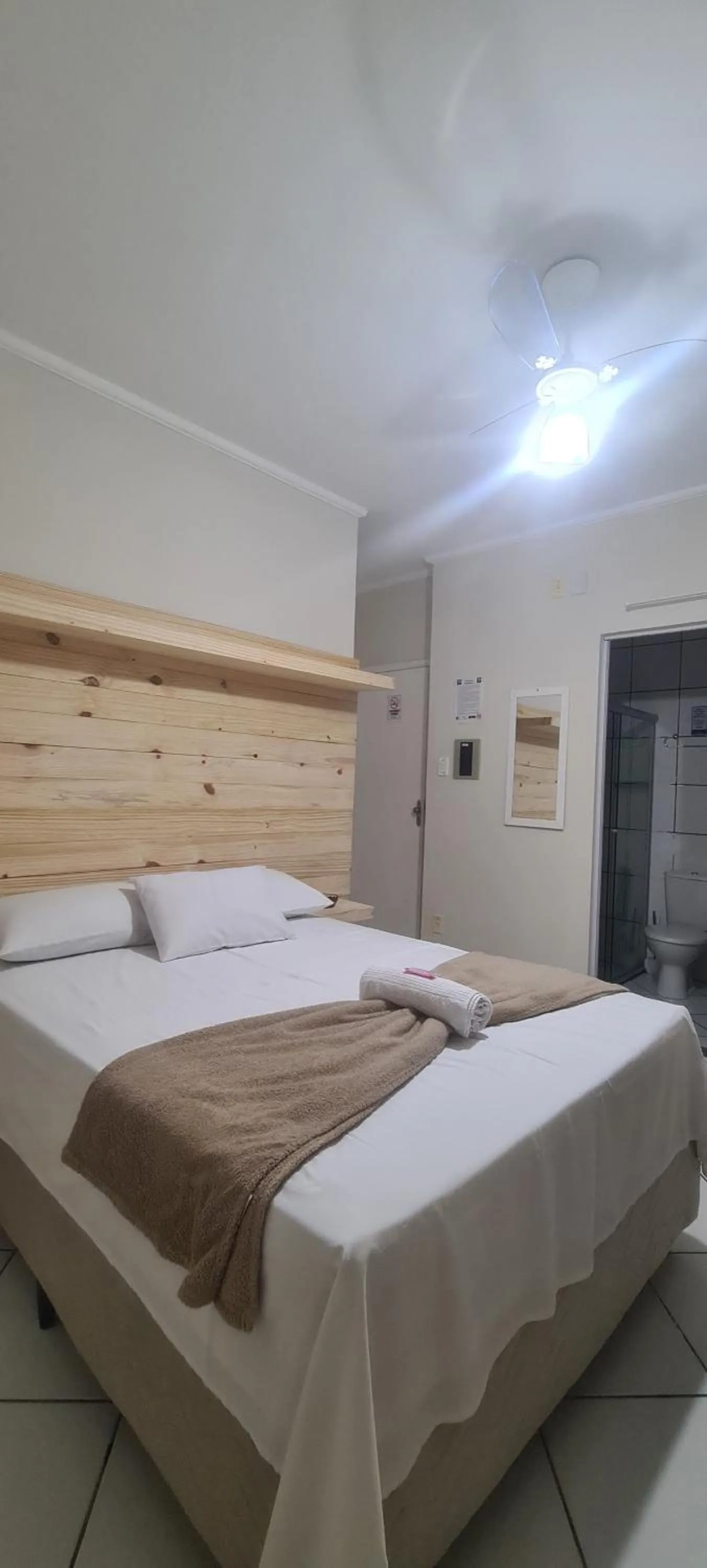 Bed in Hotel Aconchegante