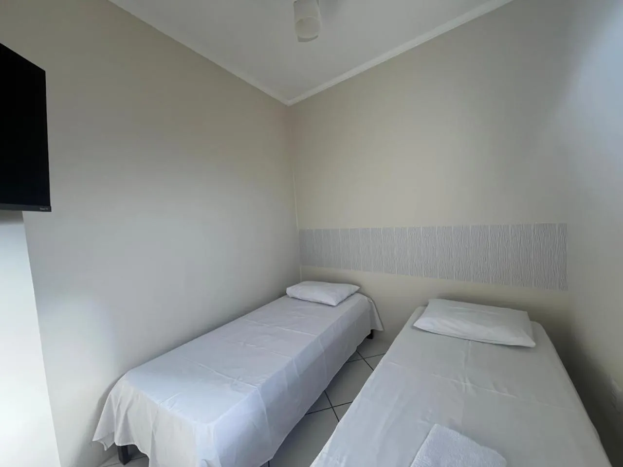 Bed in Hotel Aconchegante