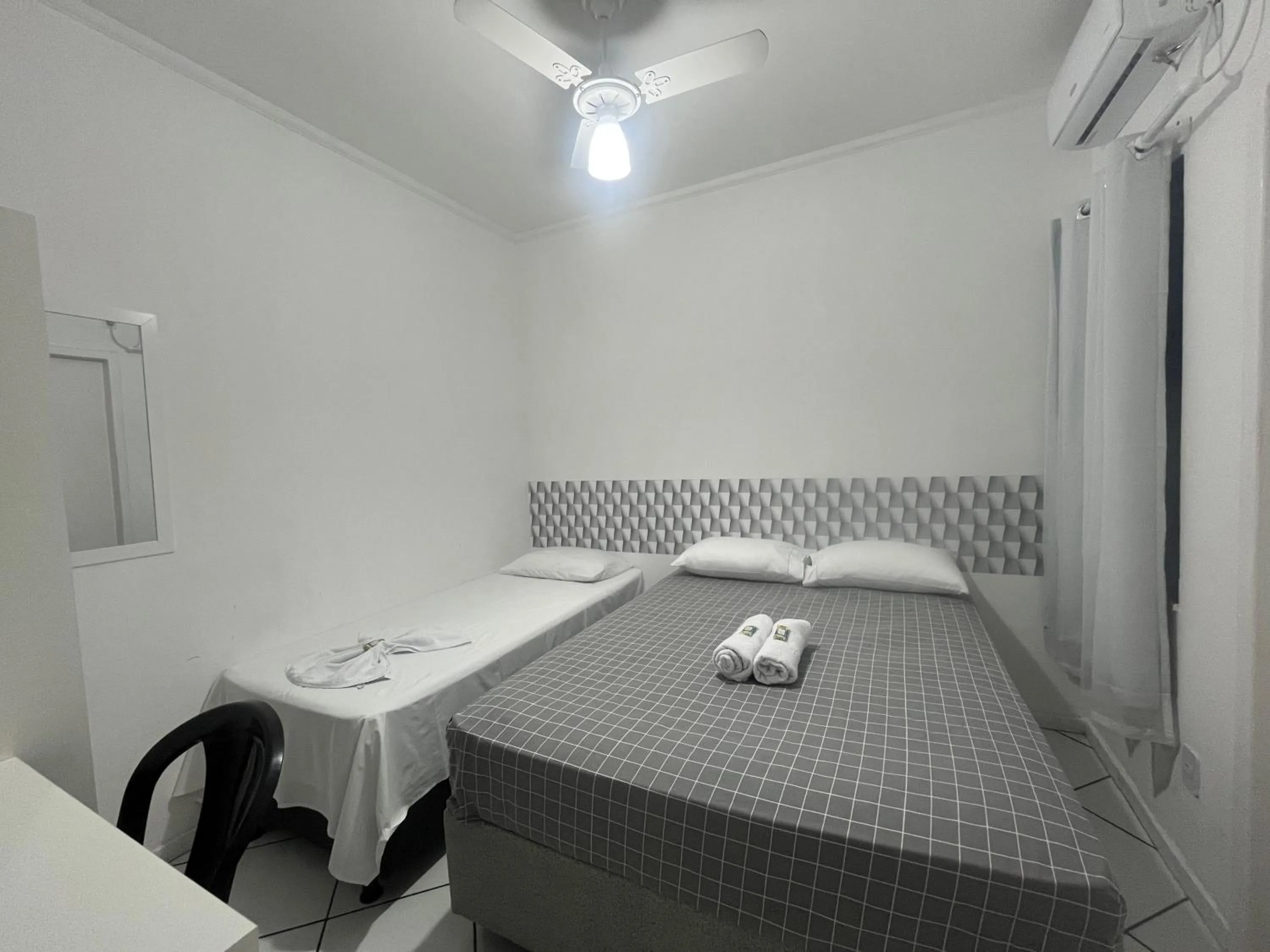 Bed in Hotel Aconchegante