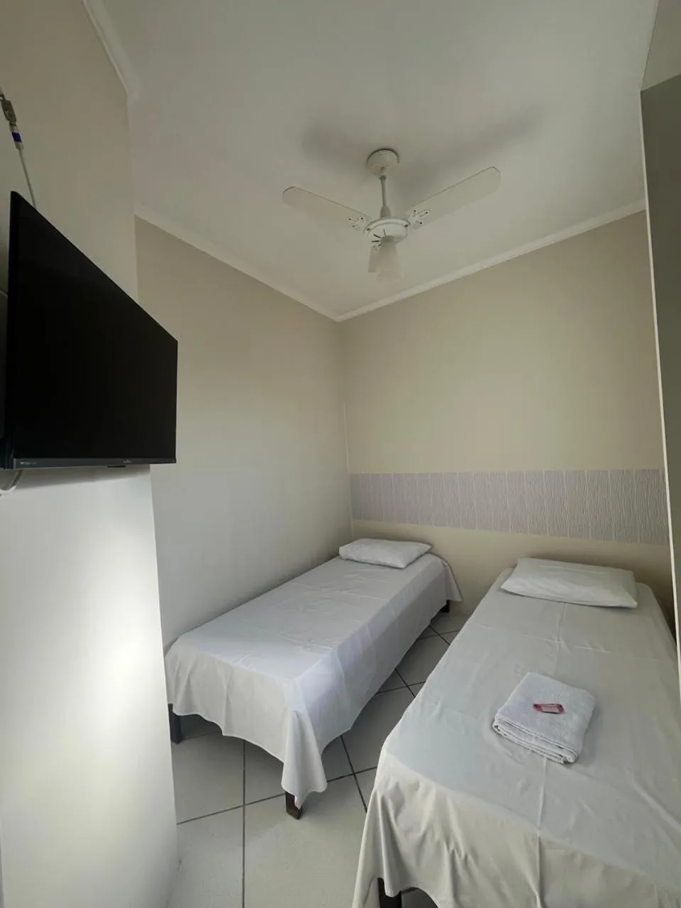 Bed in Hotel Aconchegante