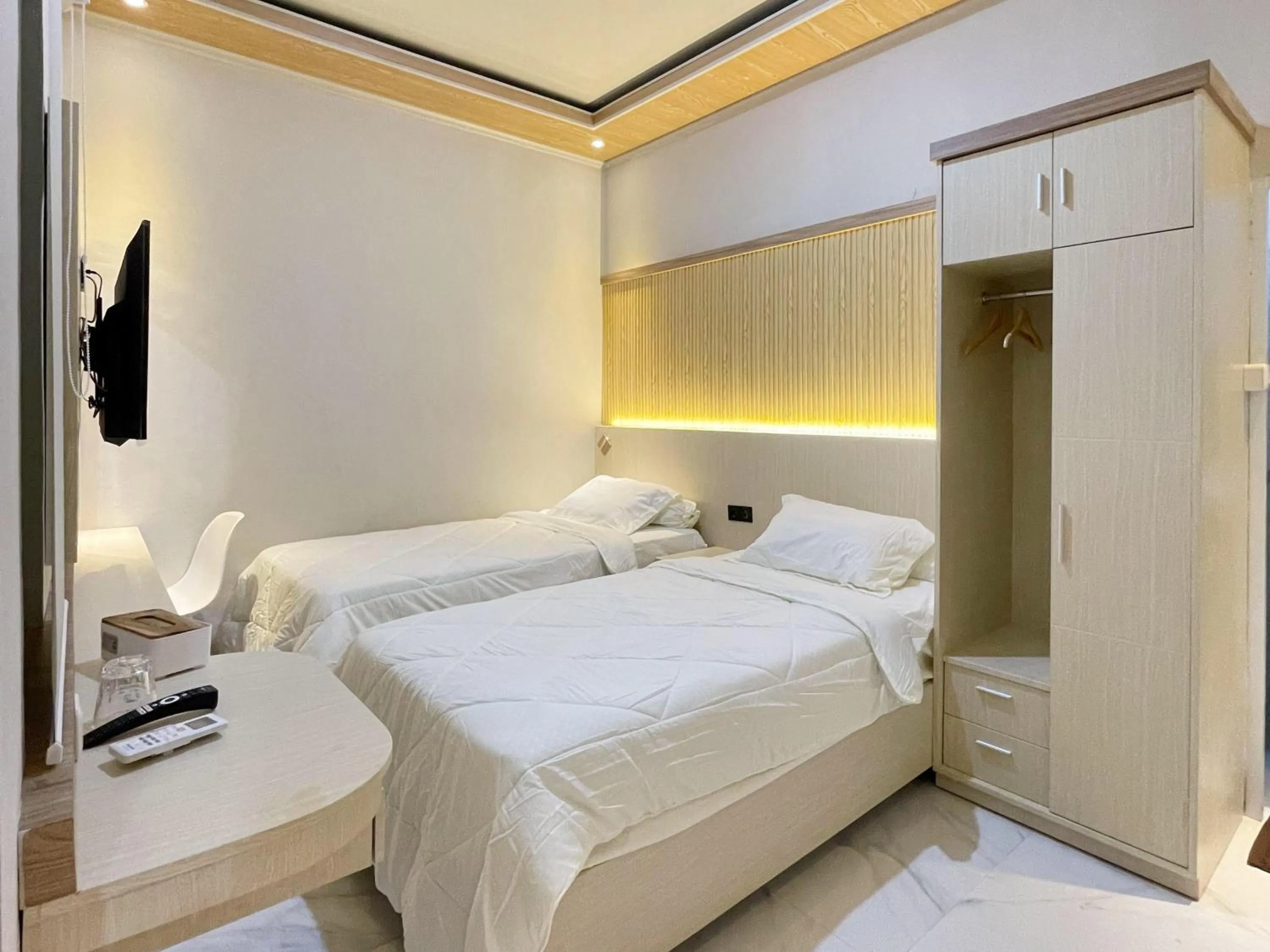 Bedroom, Bed in Urbanview Hotel Wollangi Syariah Panakkukang Makassar