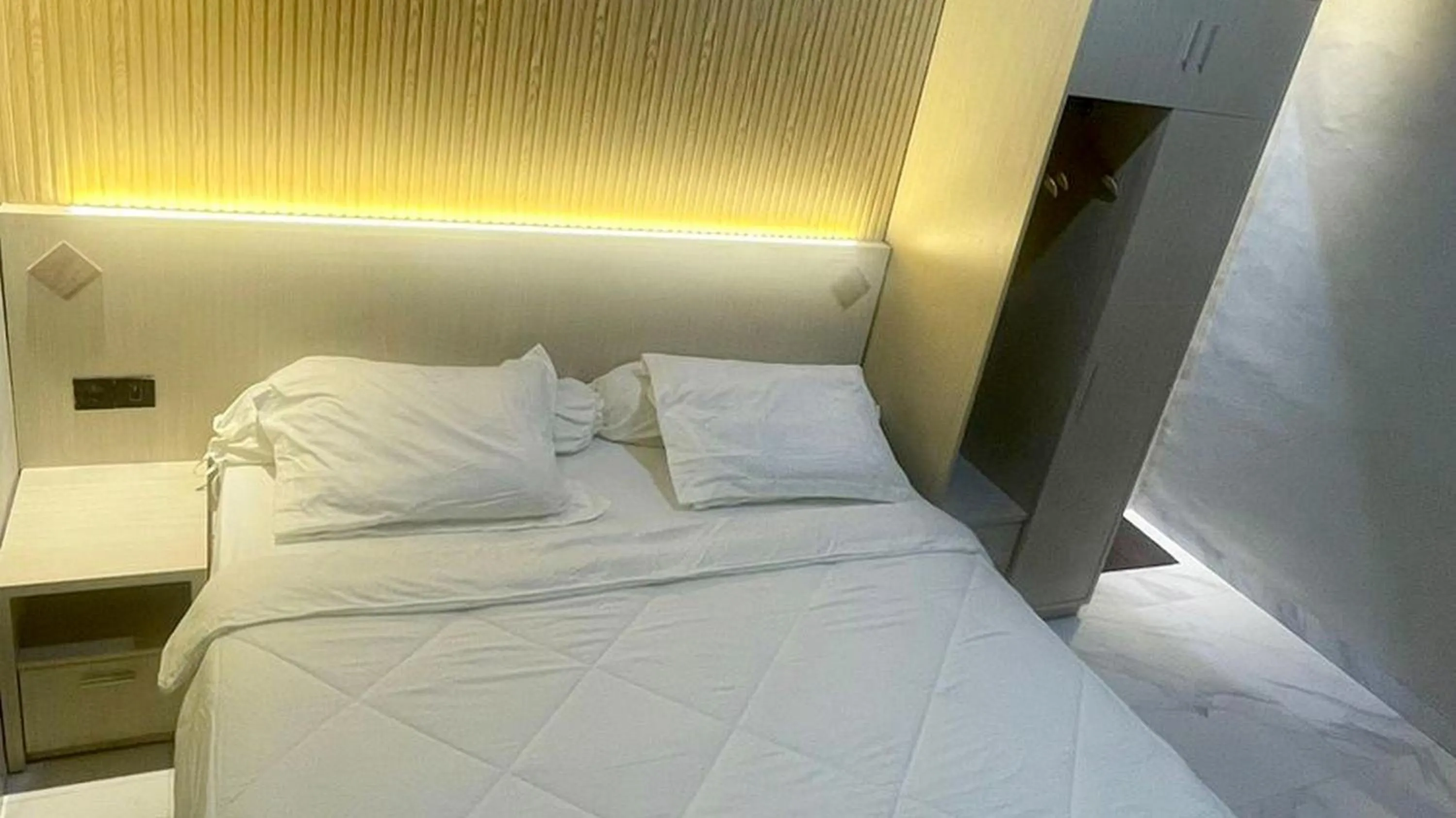 Bedroom, Bed in Urbanview Hotel Wollangi Syariah Panakkukang Makassar