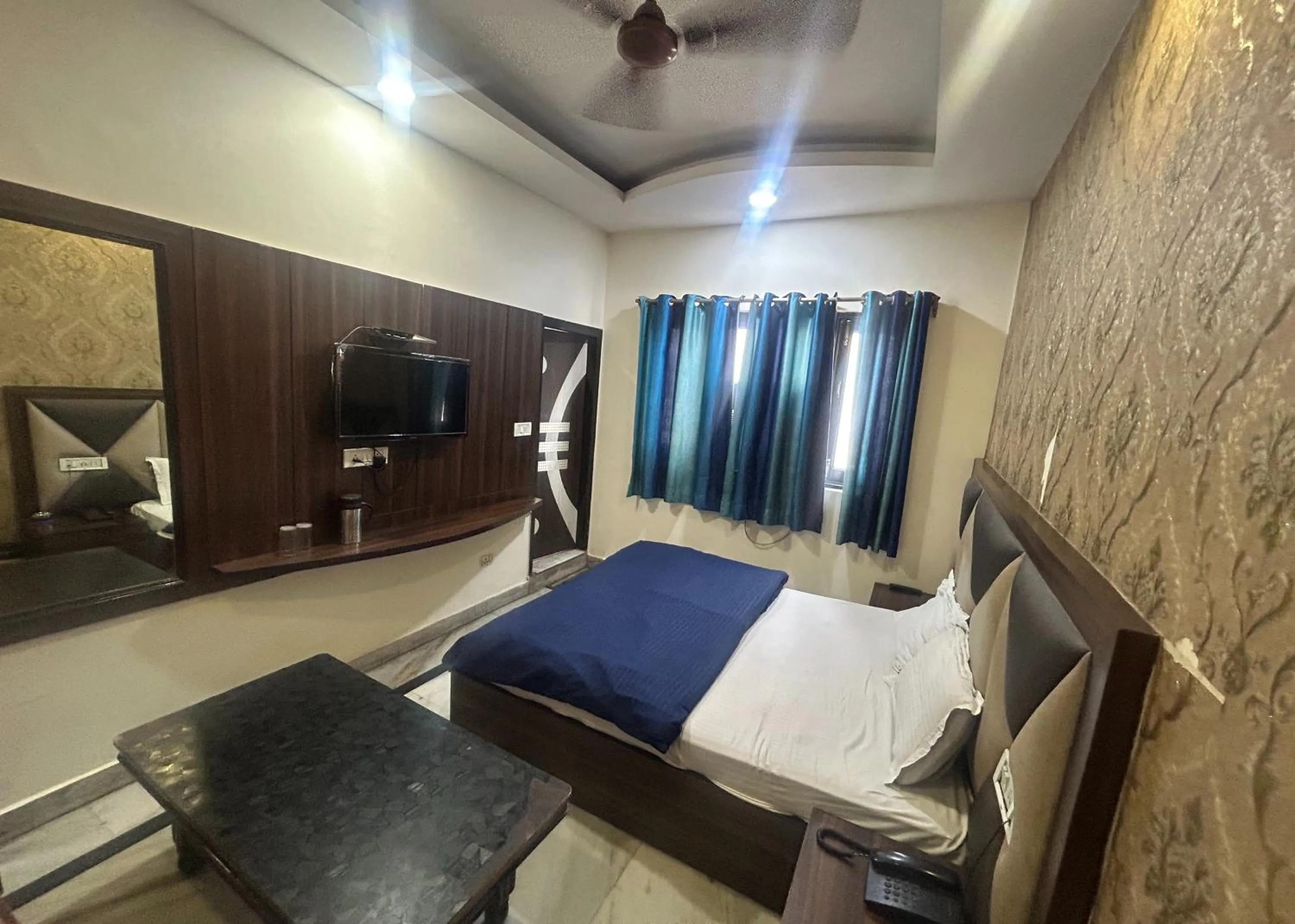 Photo of the whole room, Bed in Hotel Mourya Deluxe