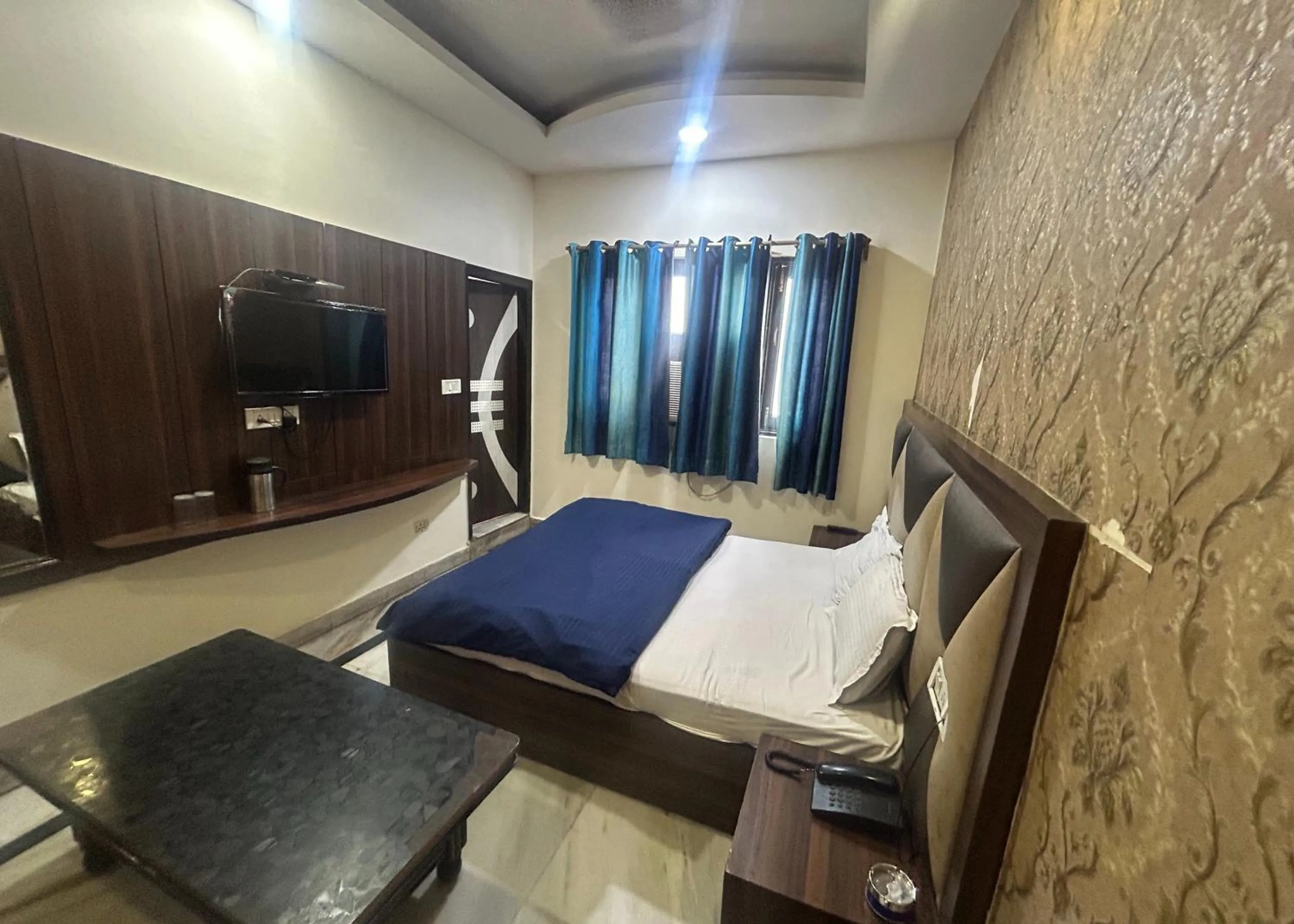 Bed in Hotel Mourya Deluxe