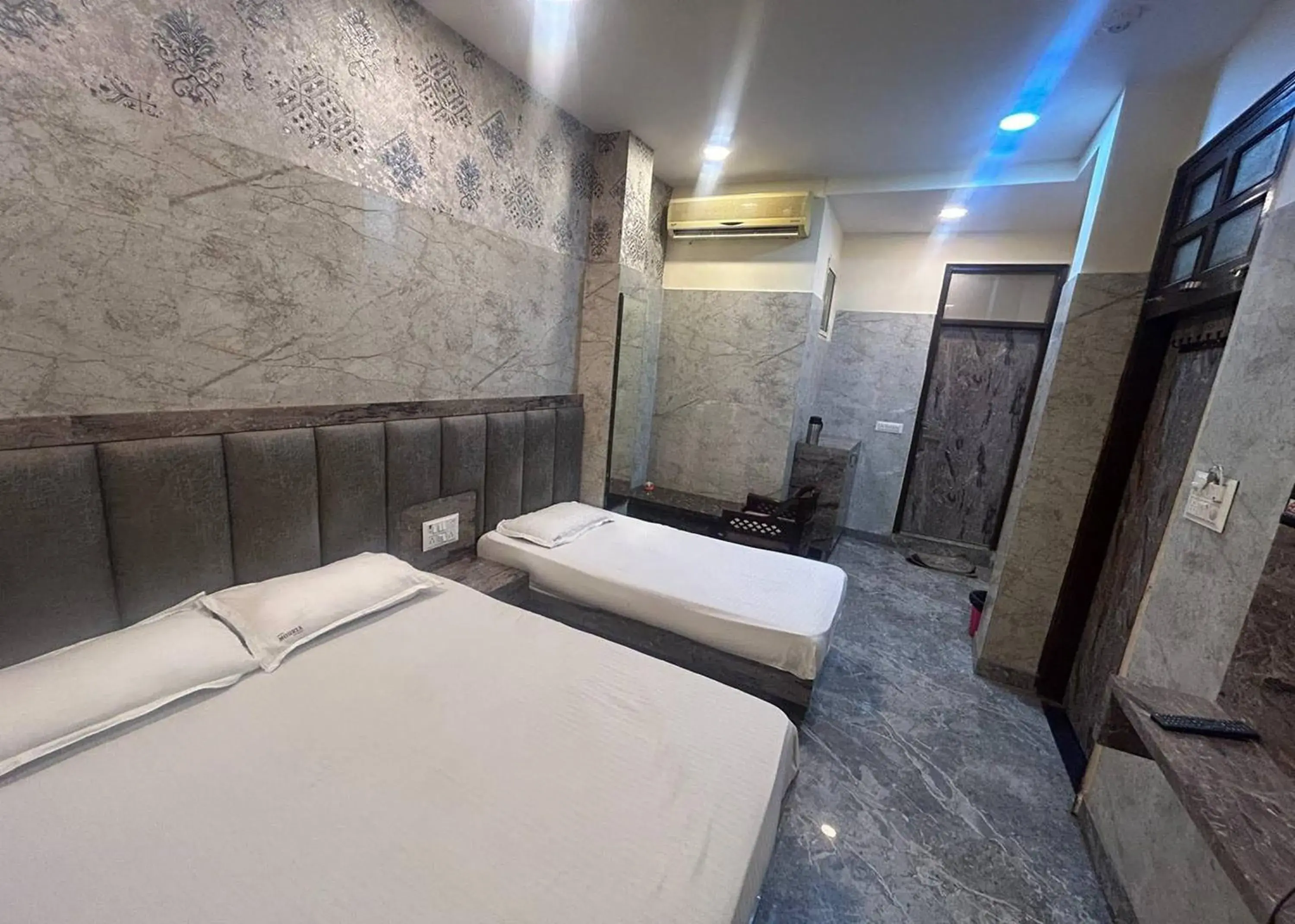 Photo of the whole room, Bed in Hotel Mourya Deluxe Photo of the whole room, Bed in Hotel Mourya Deluxe