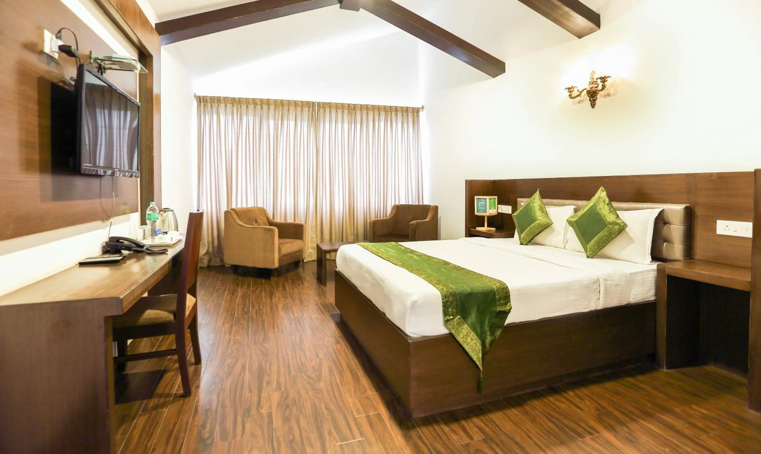 Bedroom, Bed in Treebo Skydale Inn & Suites With Mountain View