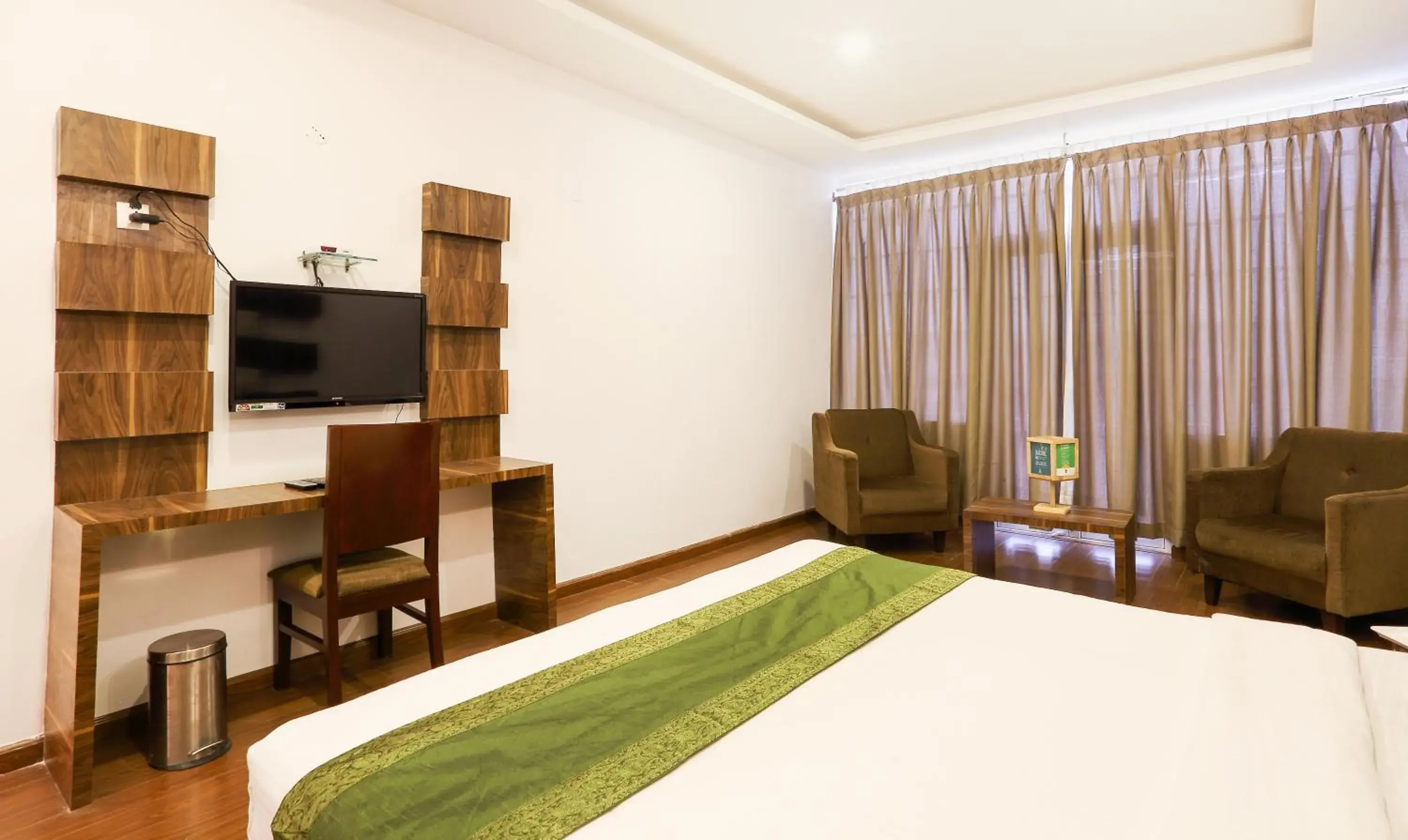 Bedroom, Bed in Treebo Skydale Inn & Suites With Mountain View Bedroom, Bed in Treebo Skydale Inn & Suites With Mountain View