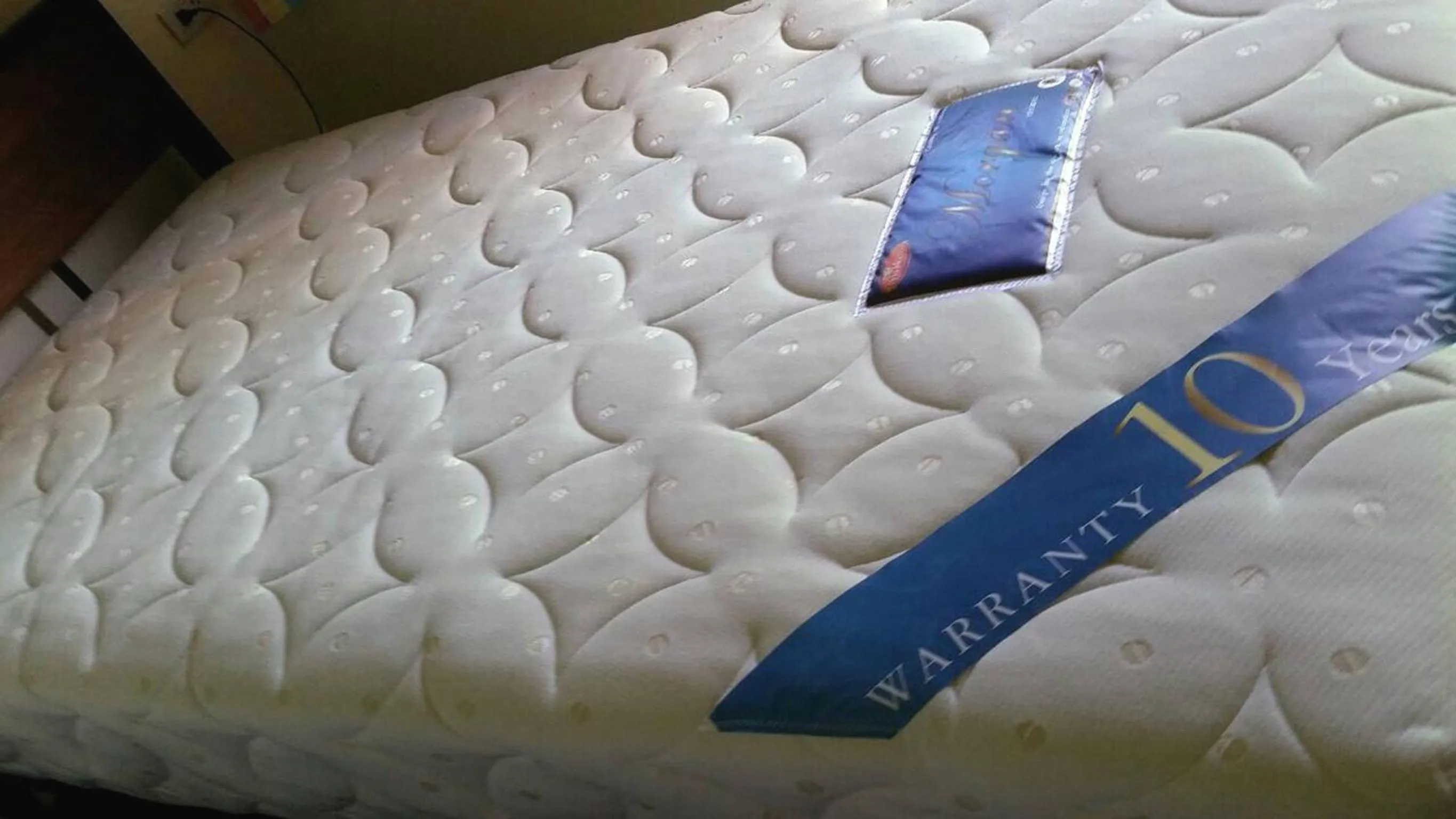 Bed in Siriwan Guesthouse