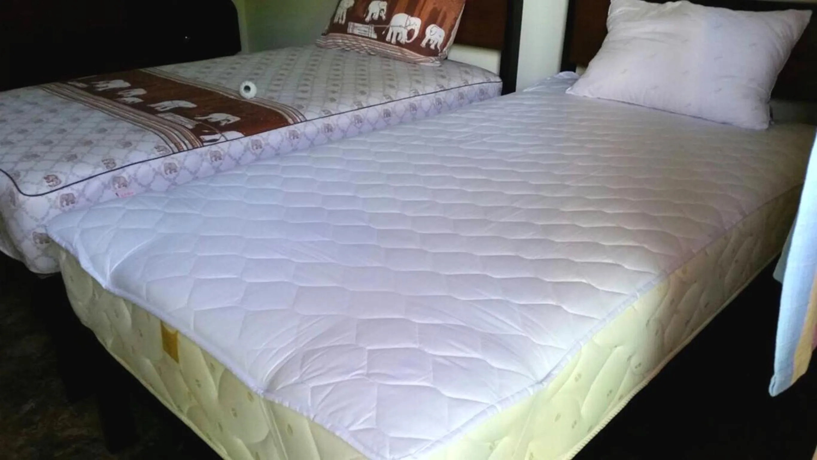 Bed in Siriwan Guesthouse