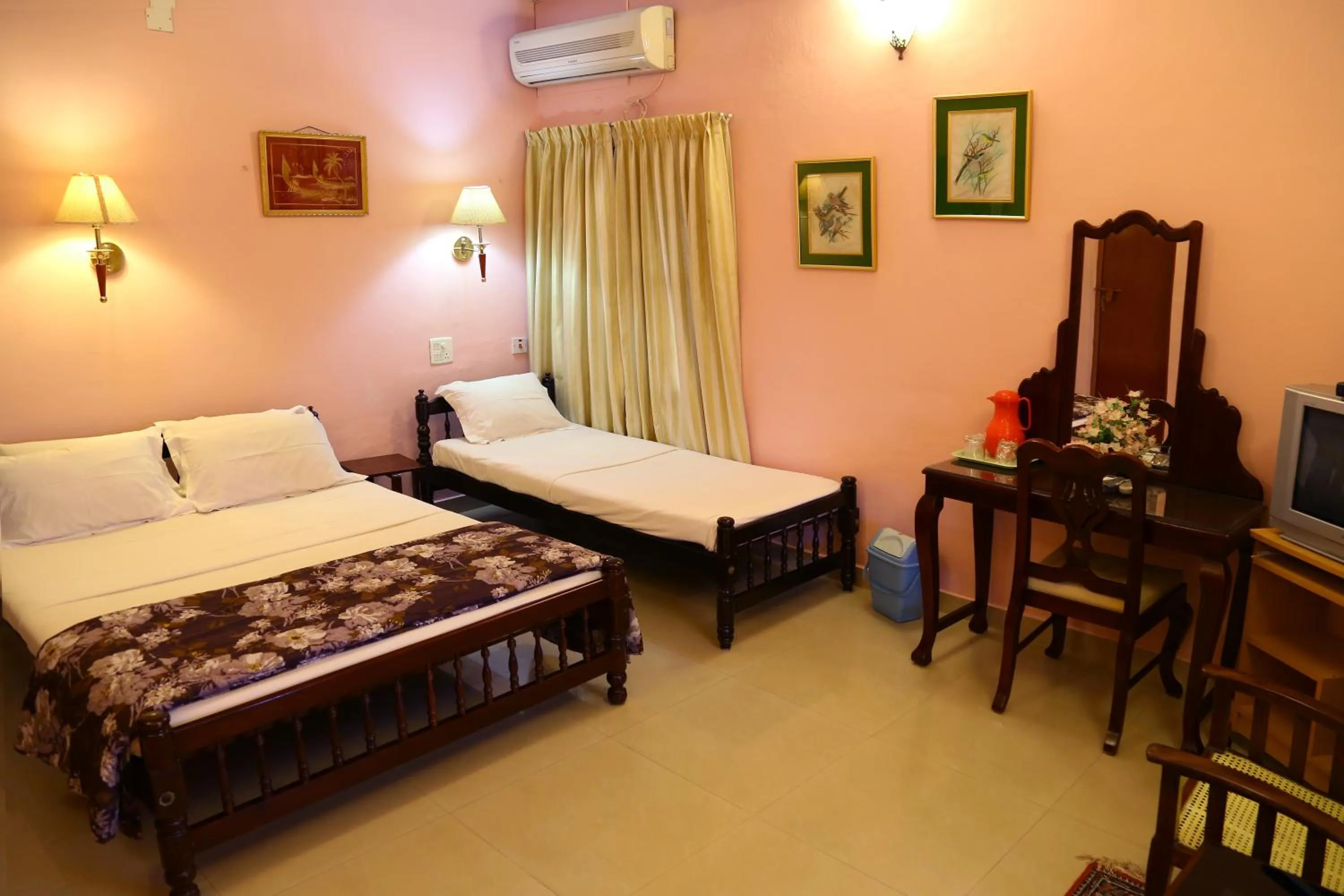 Photo of the whole room, Bed in Chiramel Residency