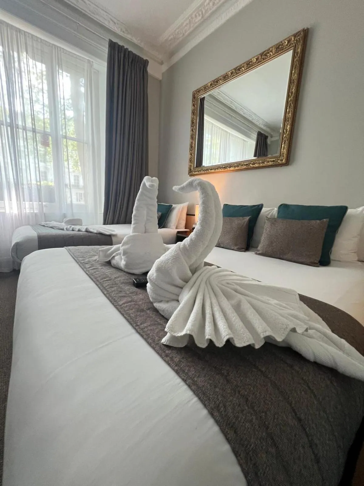 Bed in Tudor Court Hotel