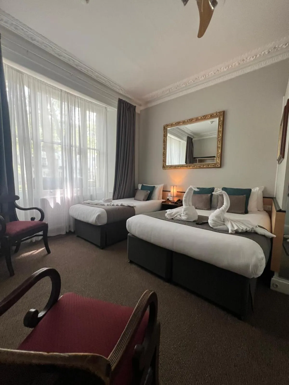 Bed in Tudor Court Hotel