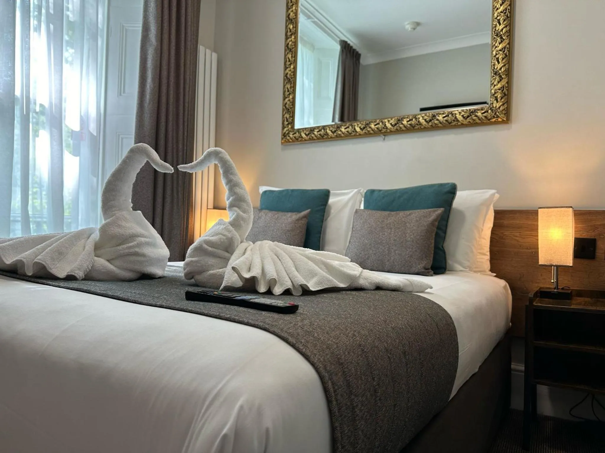 Bed in Tudor Court Hotel