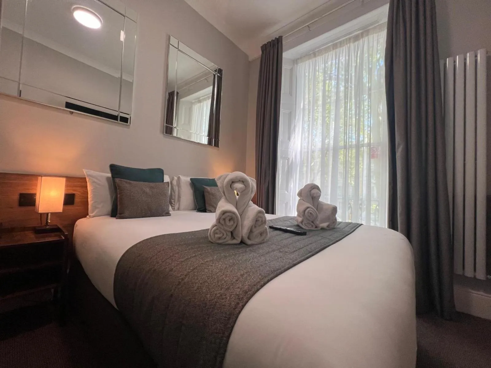 Bed in Tudor Court Hotel