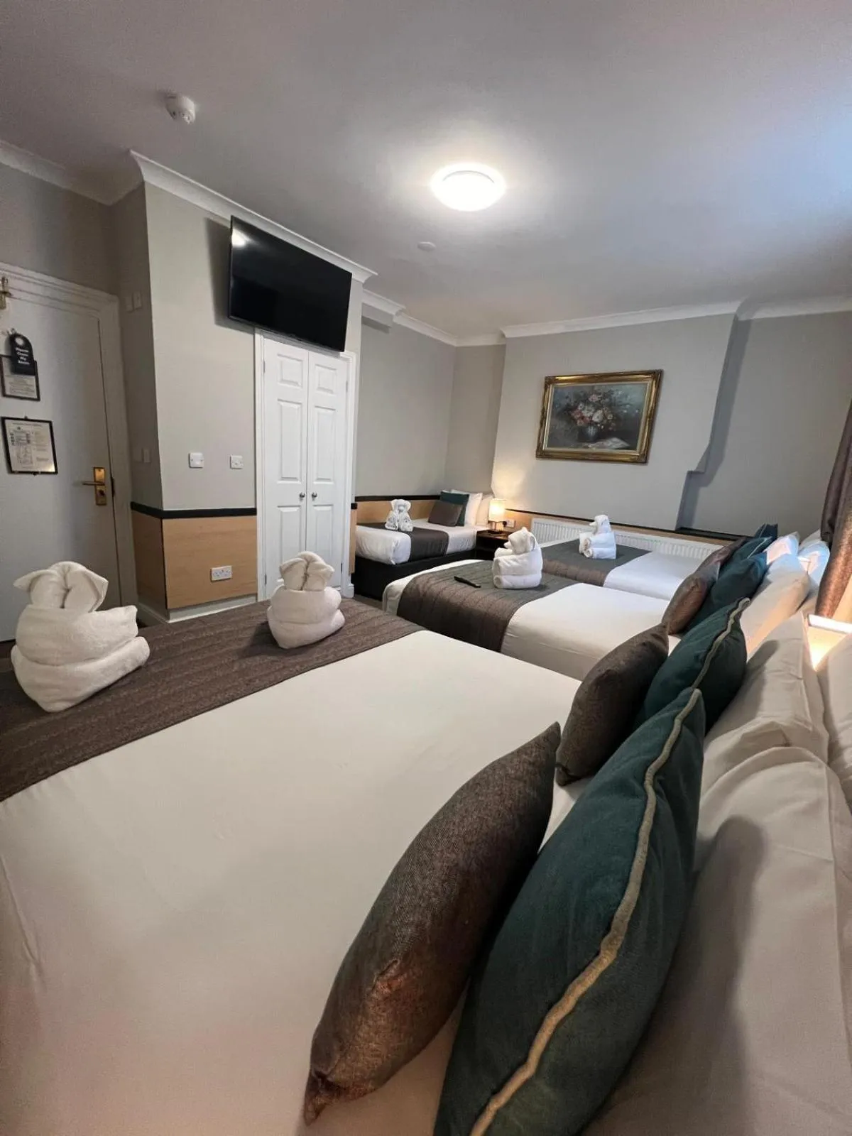 Bed in Tudor Court Hotel