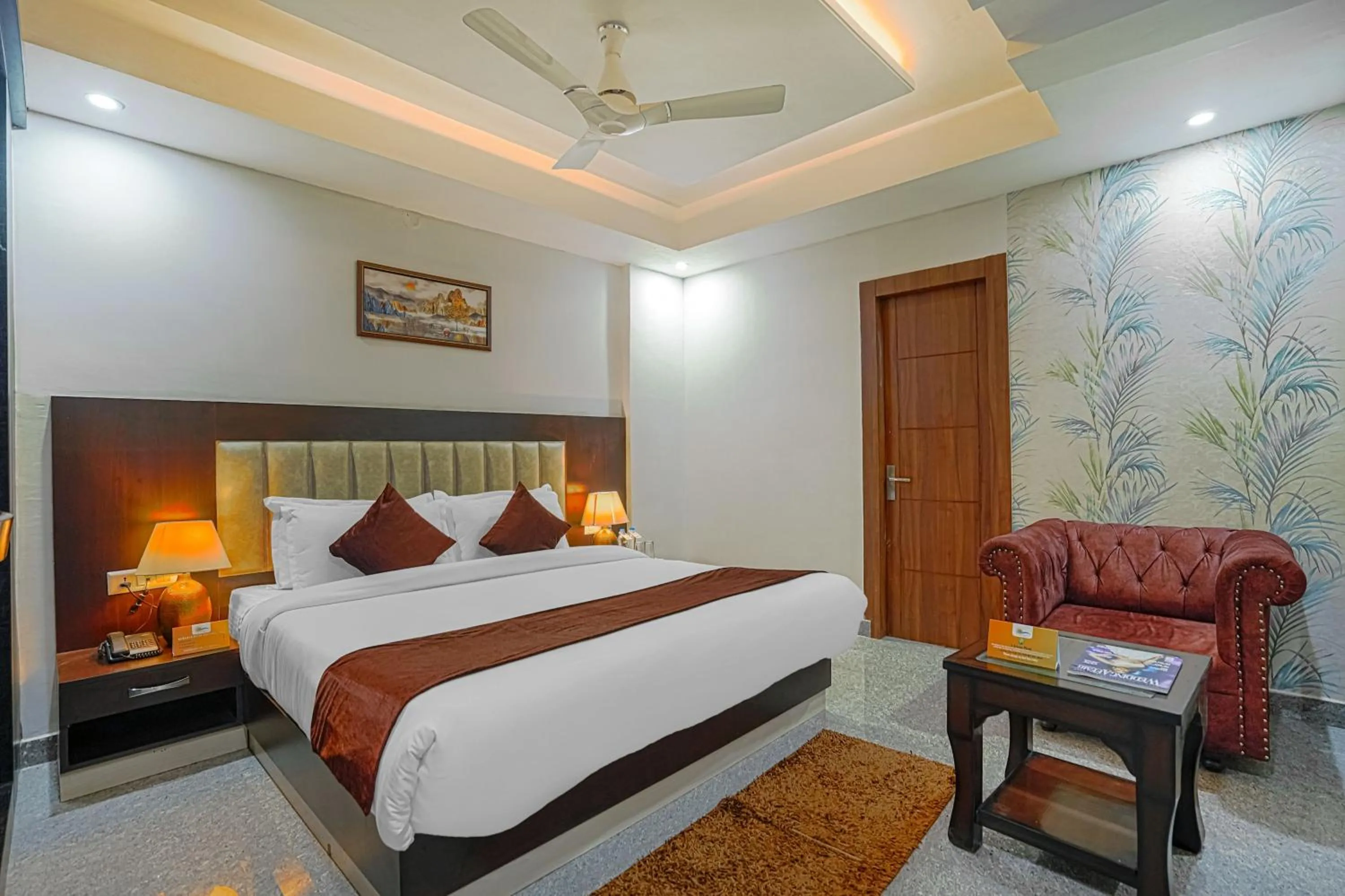 Bed in Aliza Inn And Suites By SRS Hotels