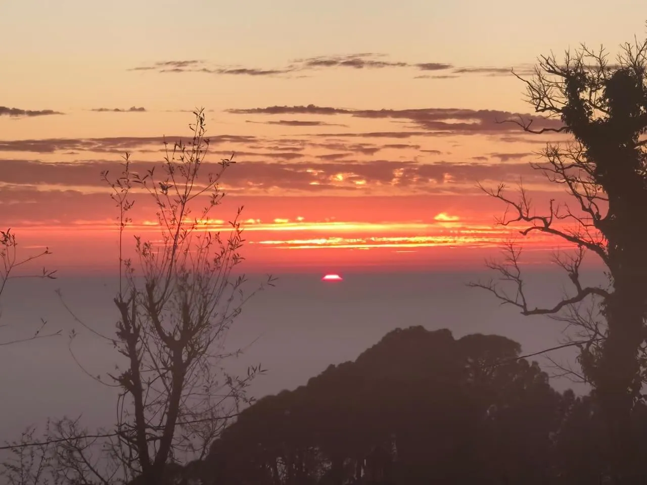 Sunset in Aliza Inn And Suites By SRS Hotels