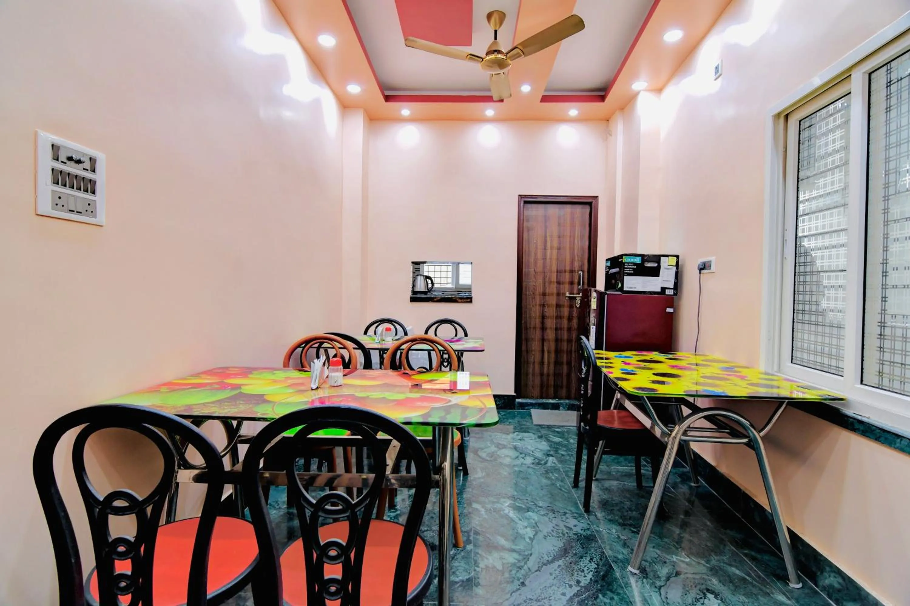 Dining area in HOTEL KANAN INN