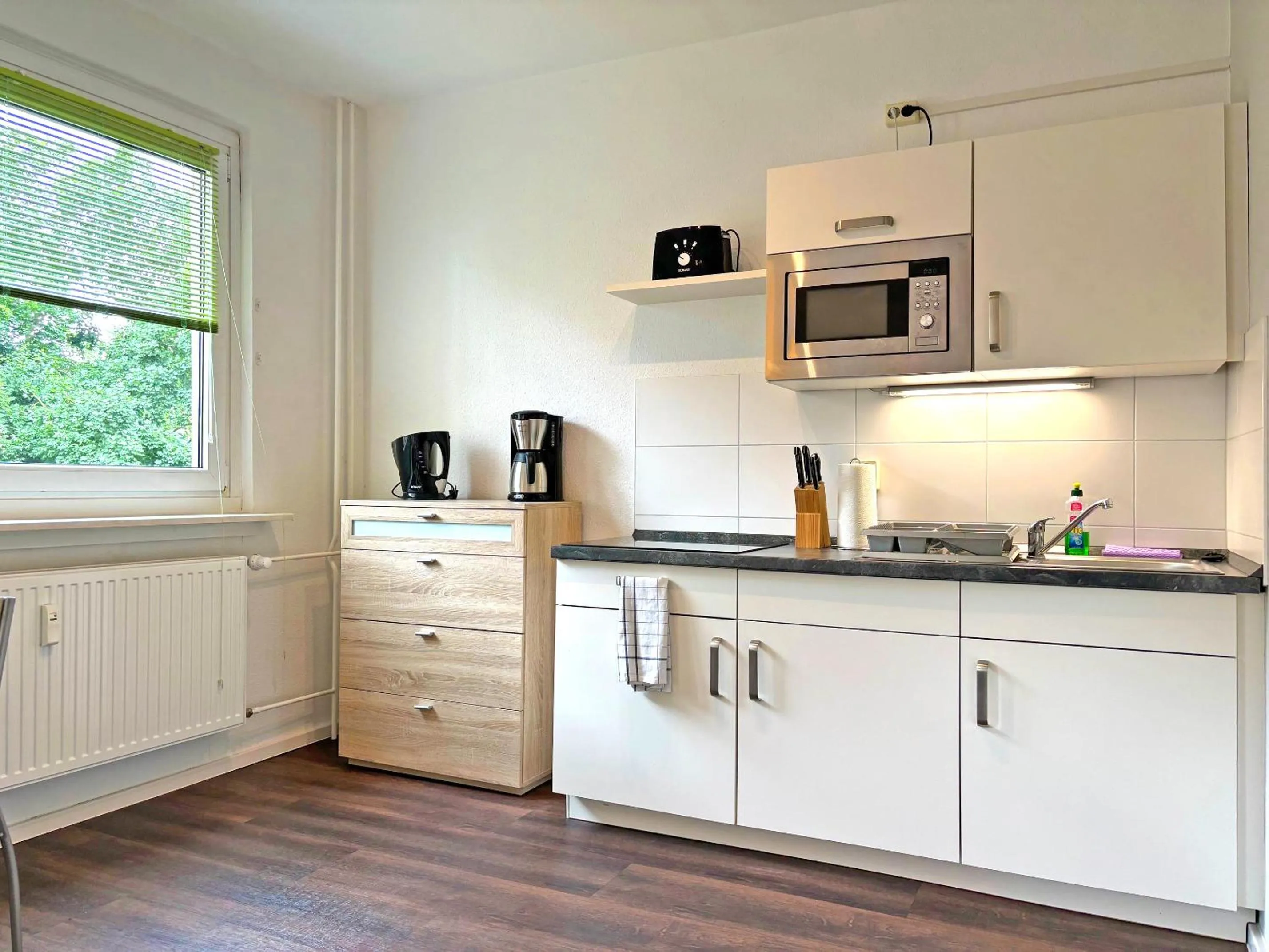 Kitchen or kitchenette in Hammerhotel Apartments Halle Saale