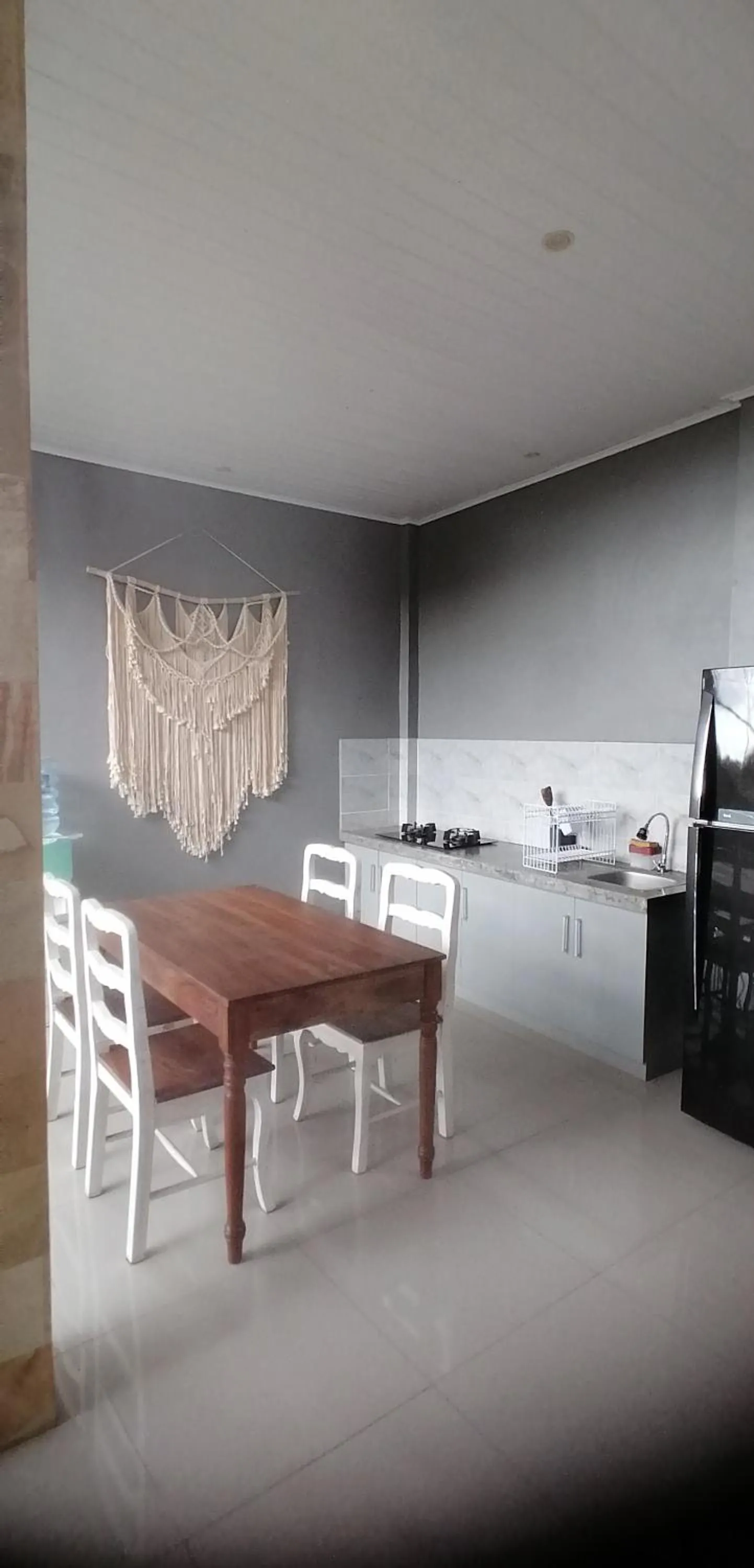 Kitchen or kitchenette in D'tegal Guest House- Tropical Courtyard in Canggu