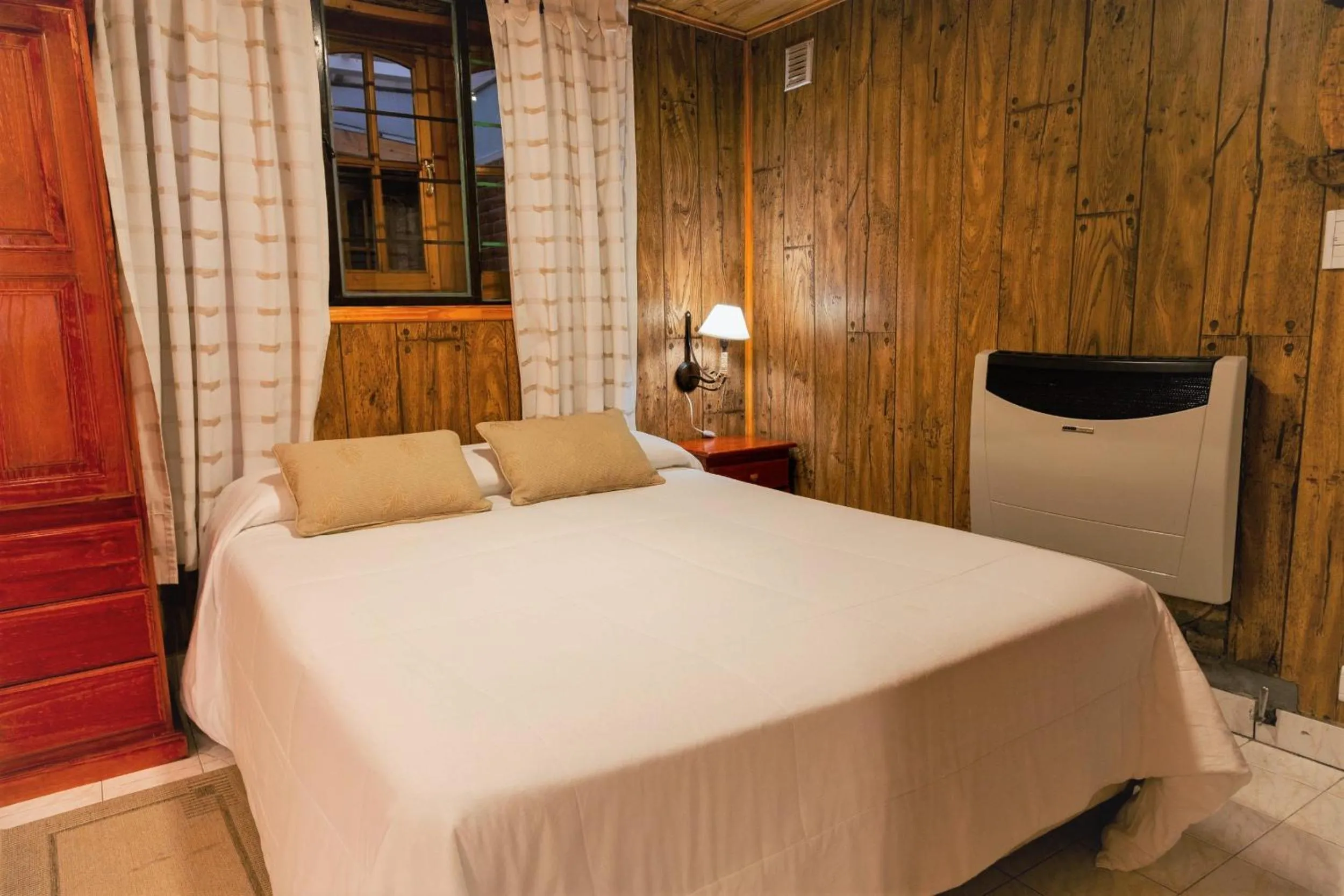 Bed in Don Pepe Hotel y Cabañas