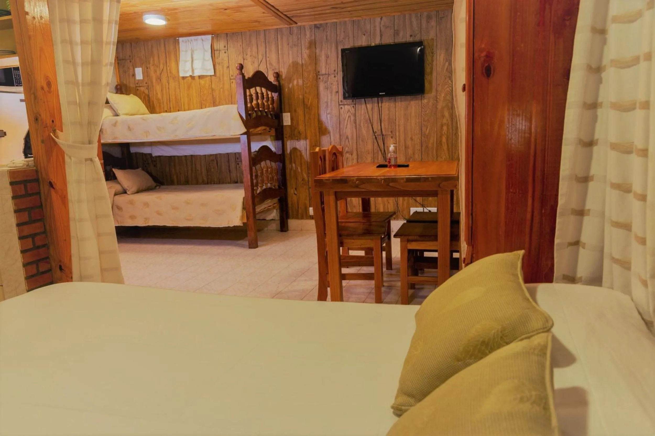 Bed in Don Pepe Hotel y Cabañas