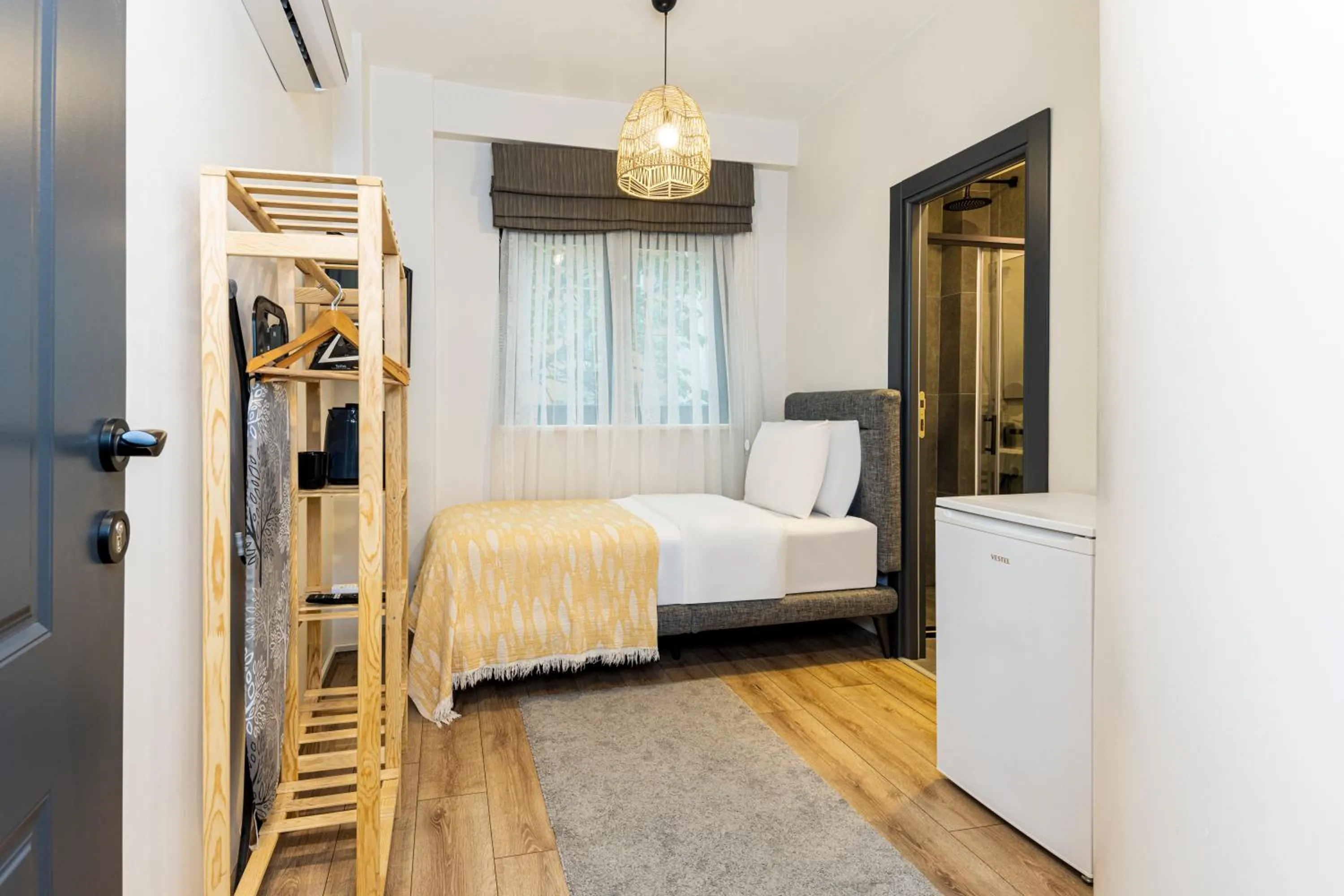 Bed in Mariposa Rooms Taksim