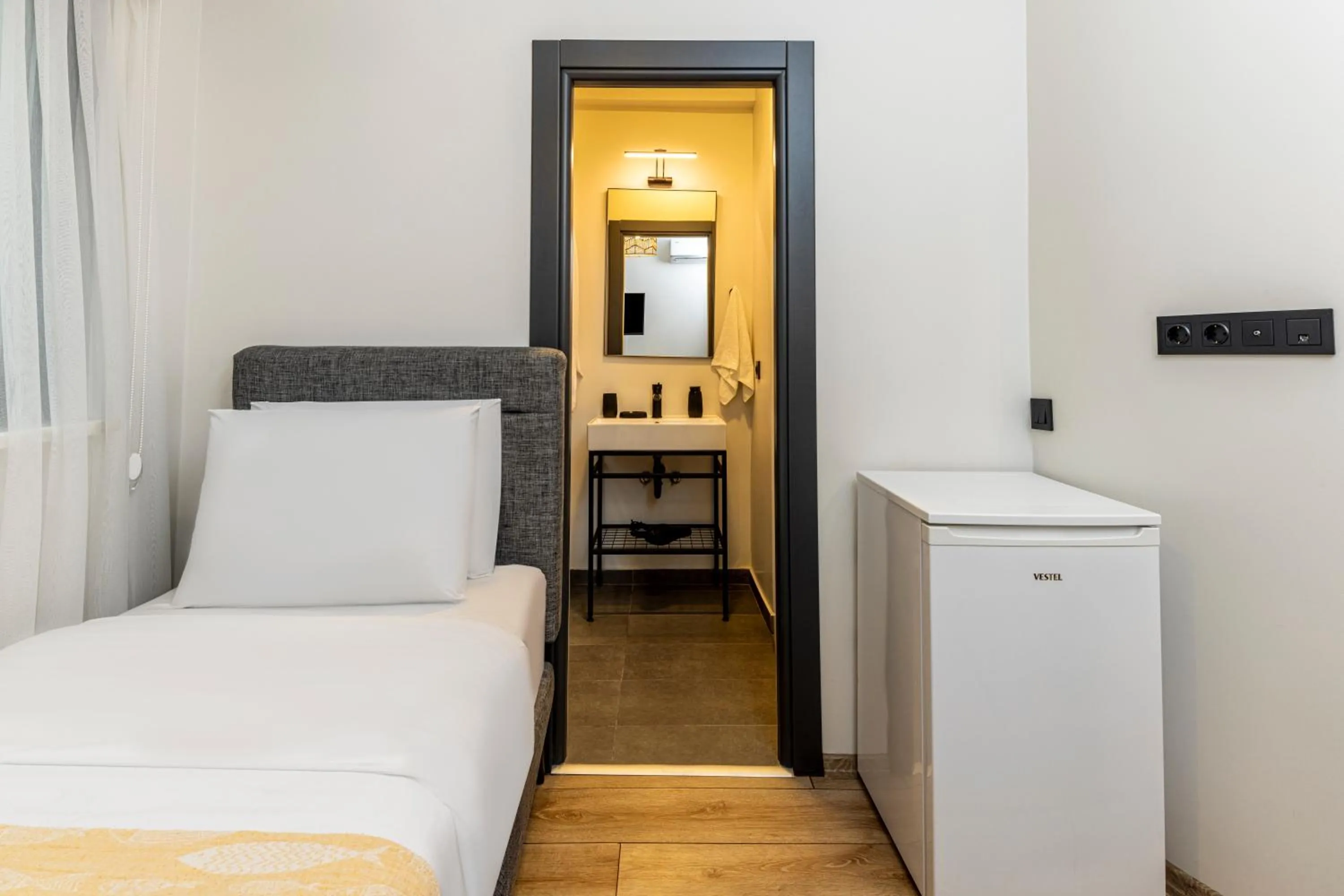 Bed in Mariposa Rooms Taksim