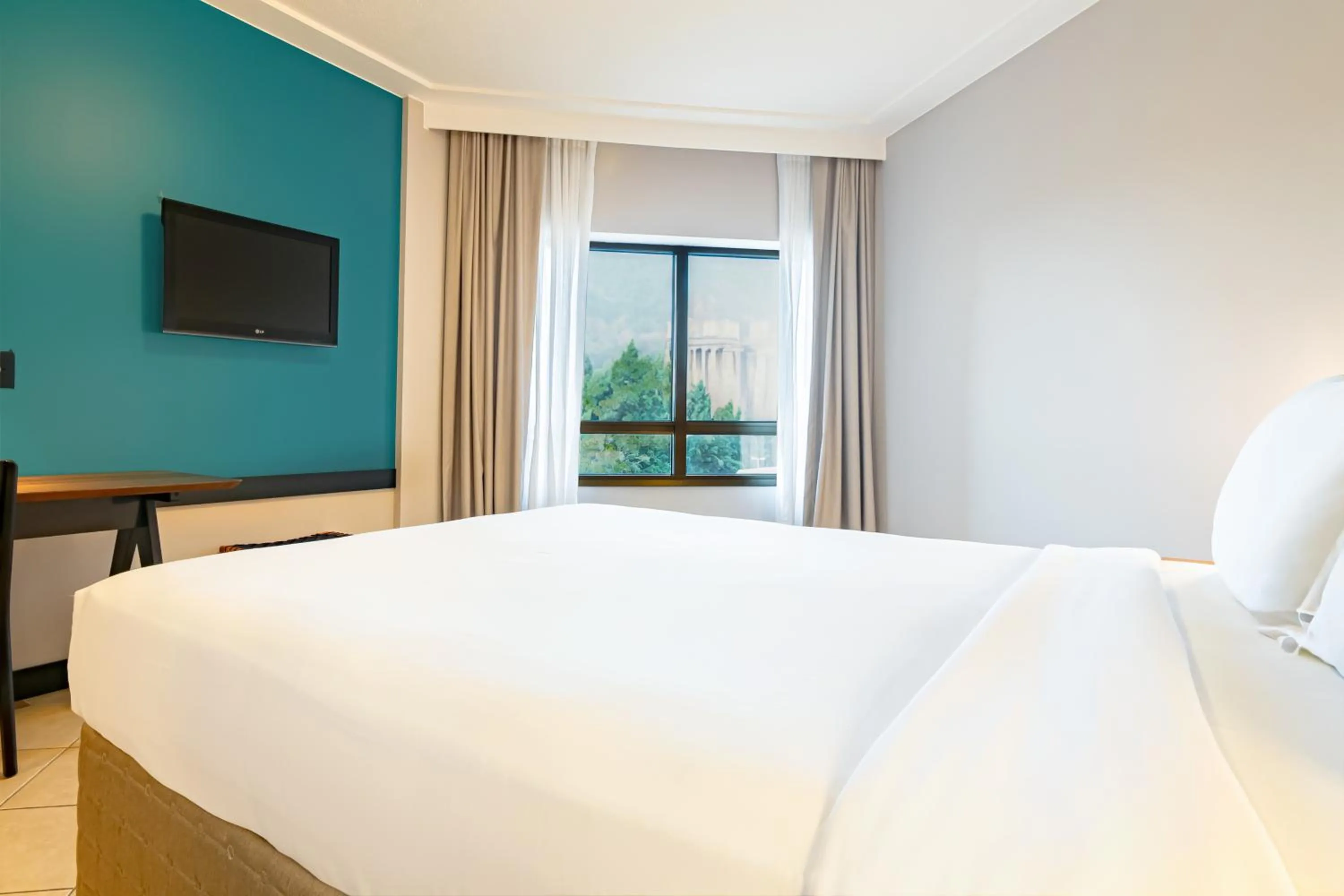 Bed in Mercure Florianópolis