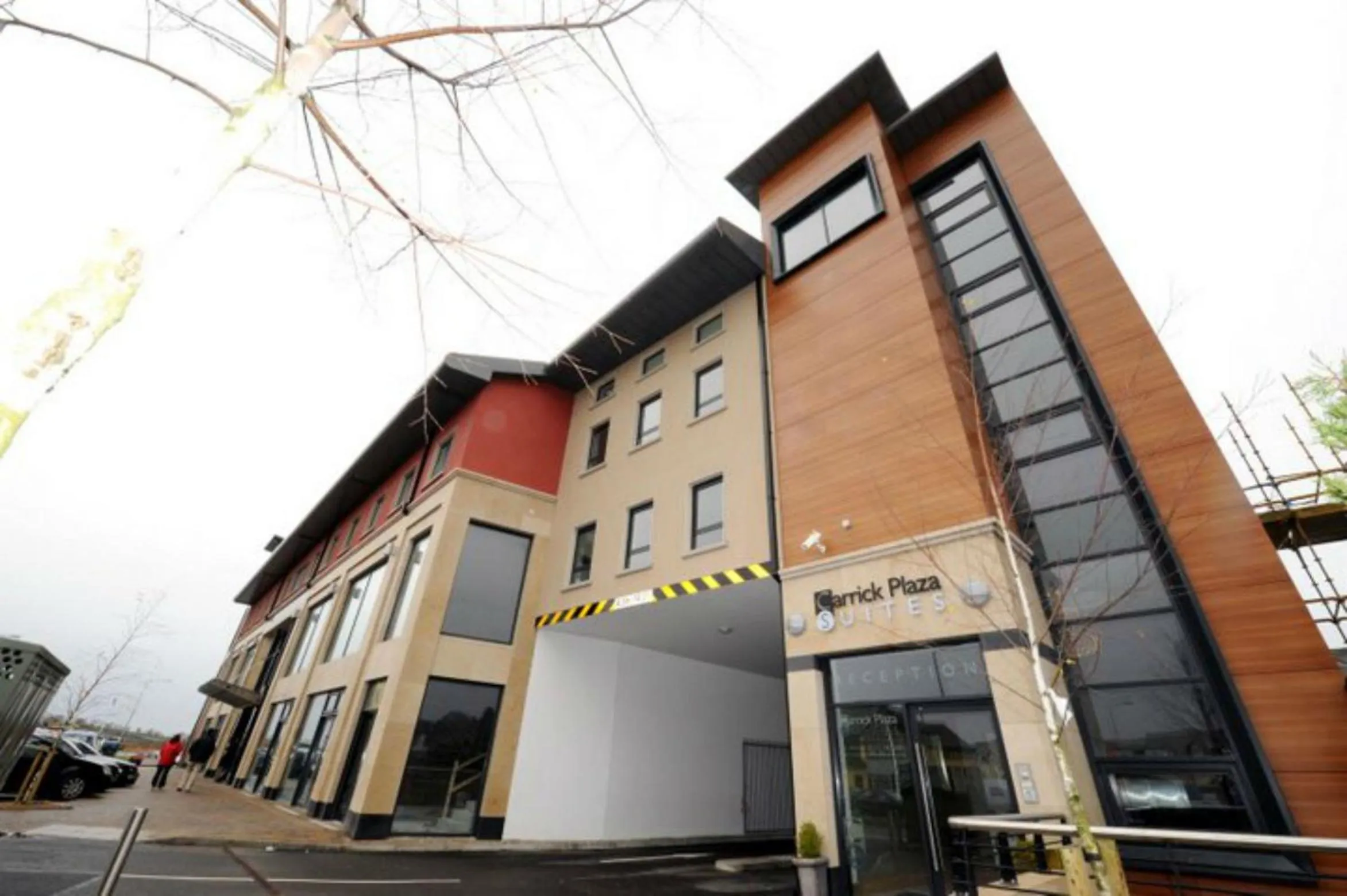 Facade/entrance in Carrick Plaza Suites and Apartments