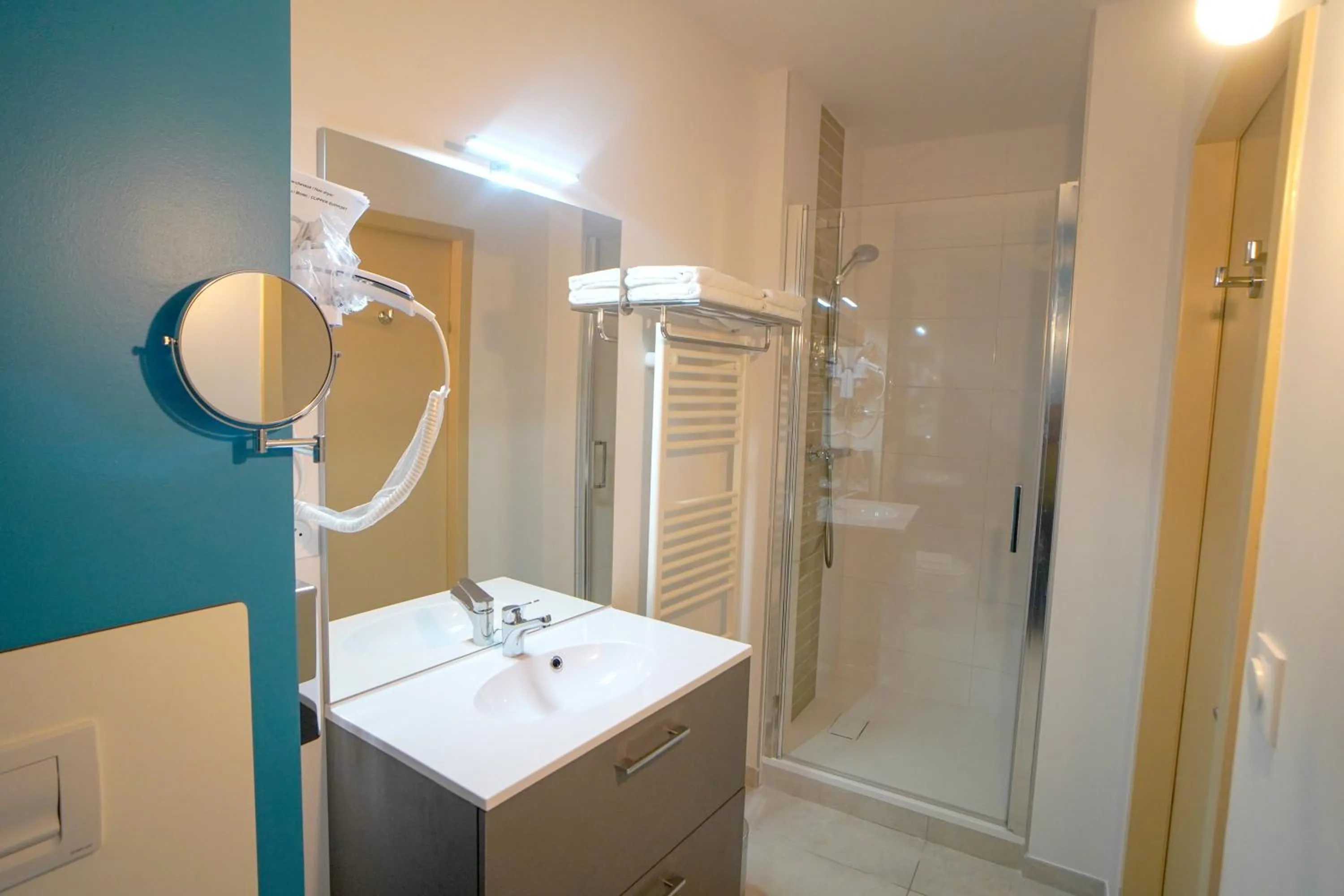 Bathroom in Hôtel de la Croix Blanche