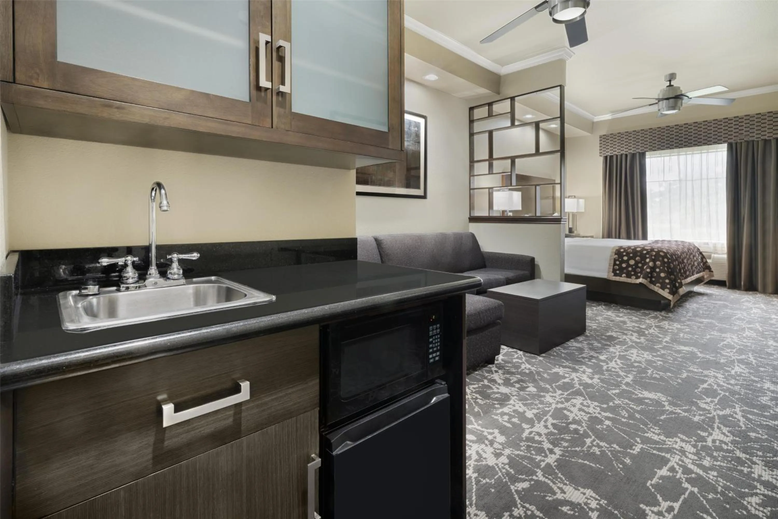 Bedroom in Best Western Premier Crown Chase Inn & Suites