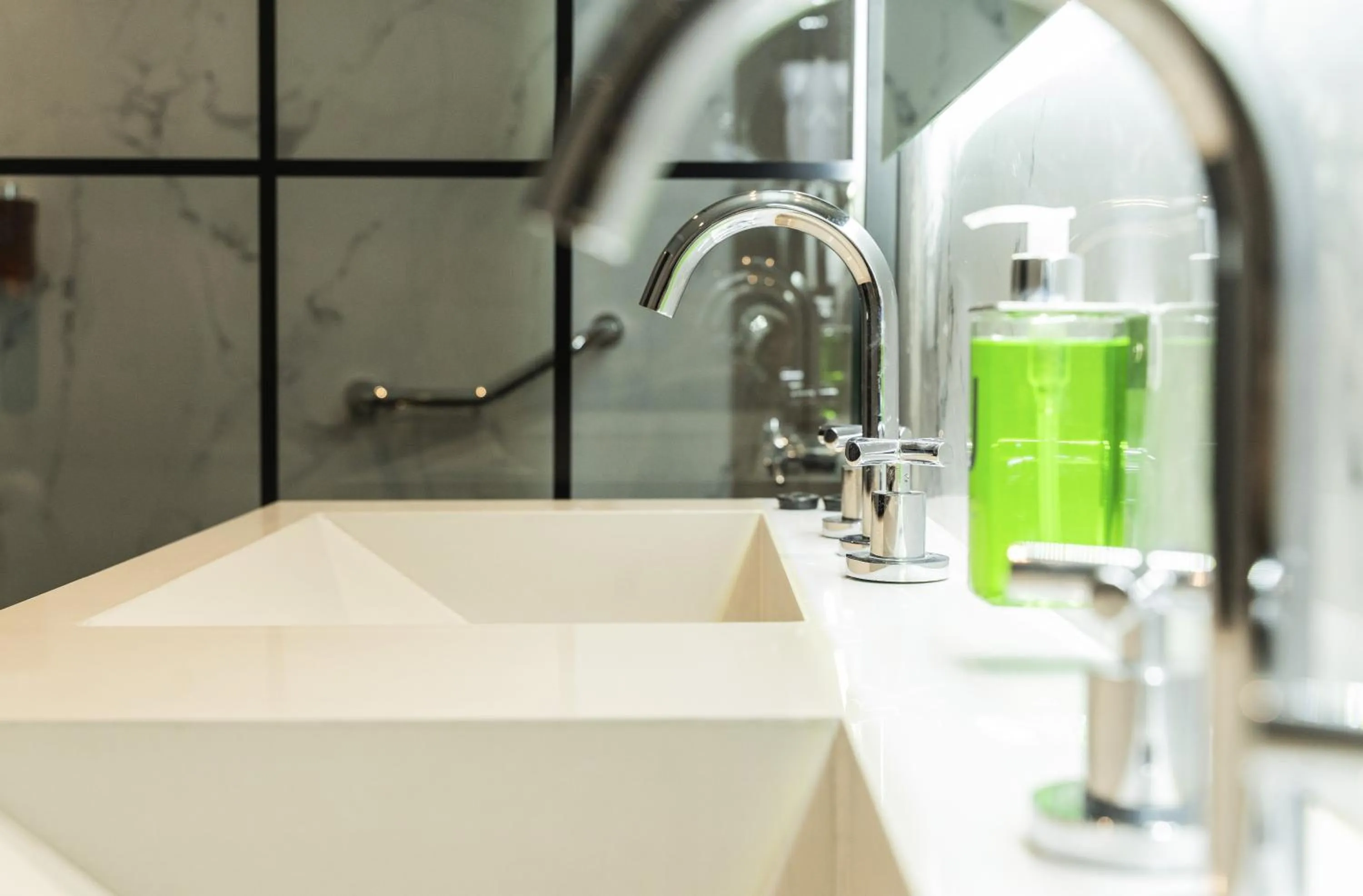 Bathroom in Palmas de la Laguna by Posada Suiza