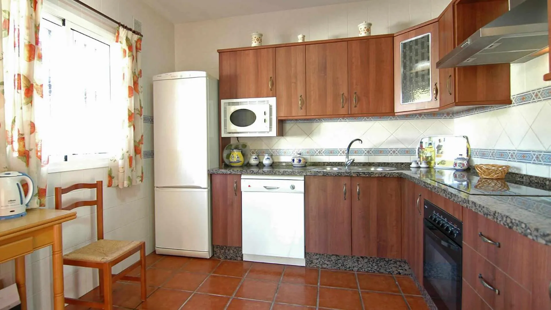 Kitchen or kitchenette in Villa La Palma