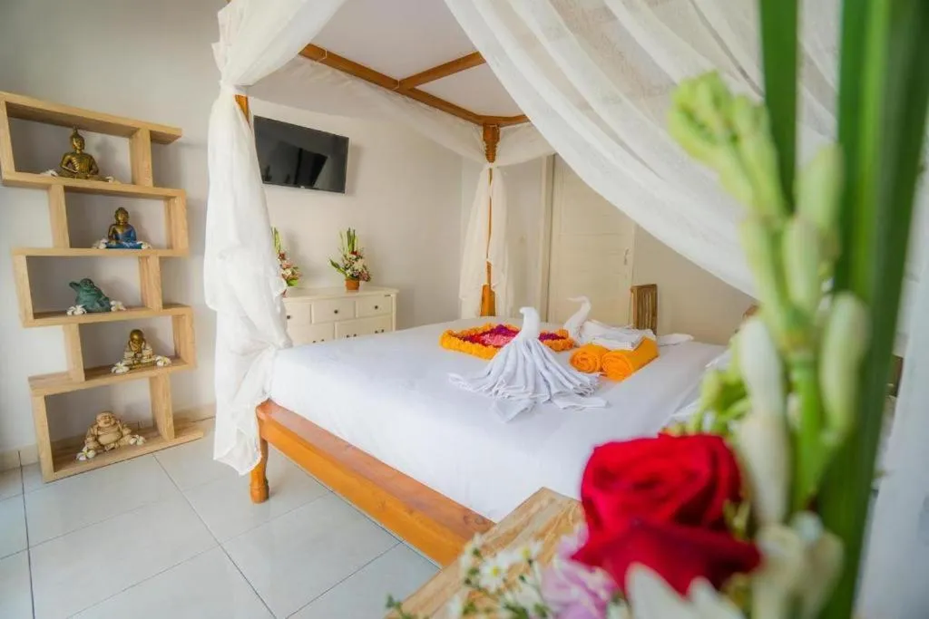 Bed in Kubu Guest House