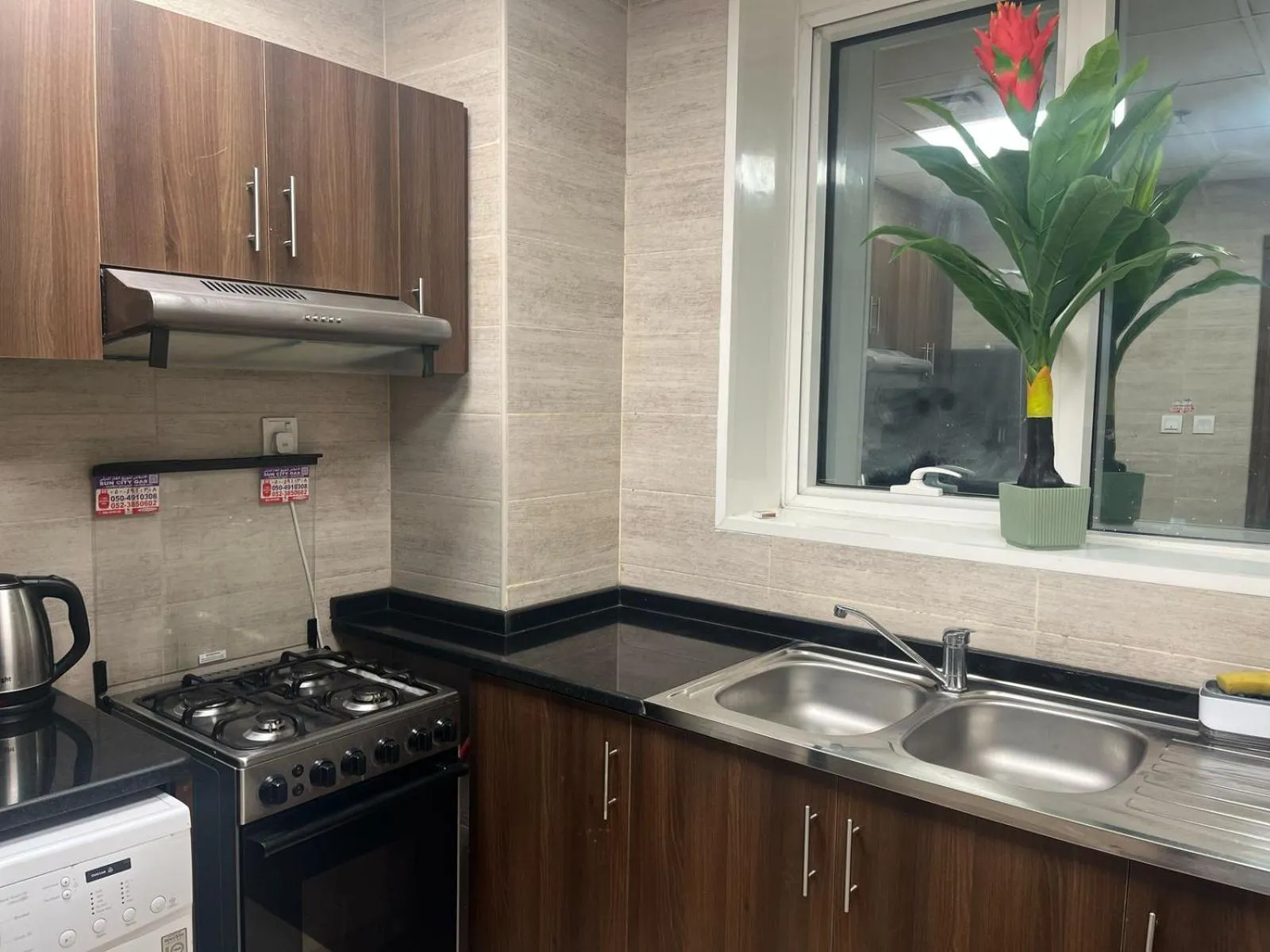 Kitchen or kitchenette in Oasis tower family apartment 2302