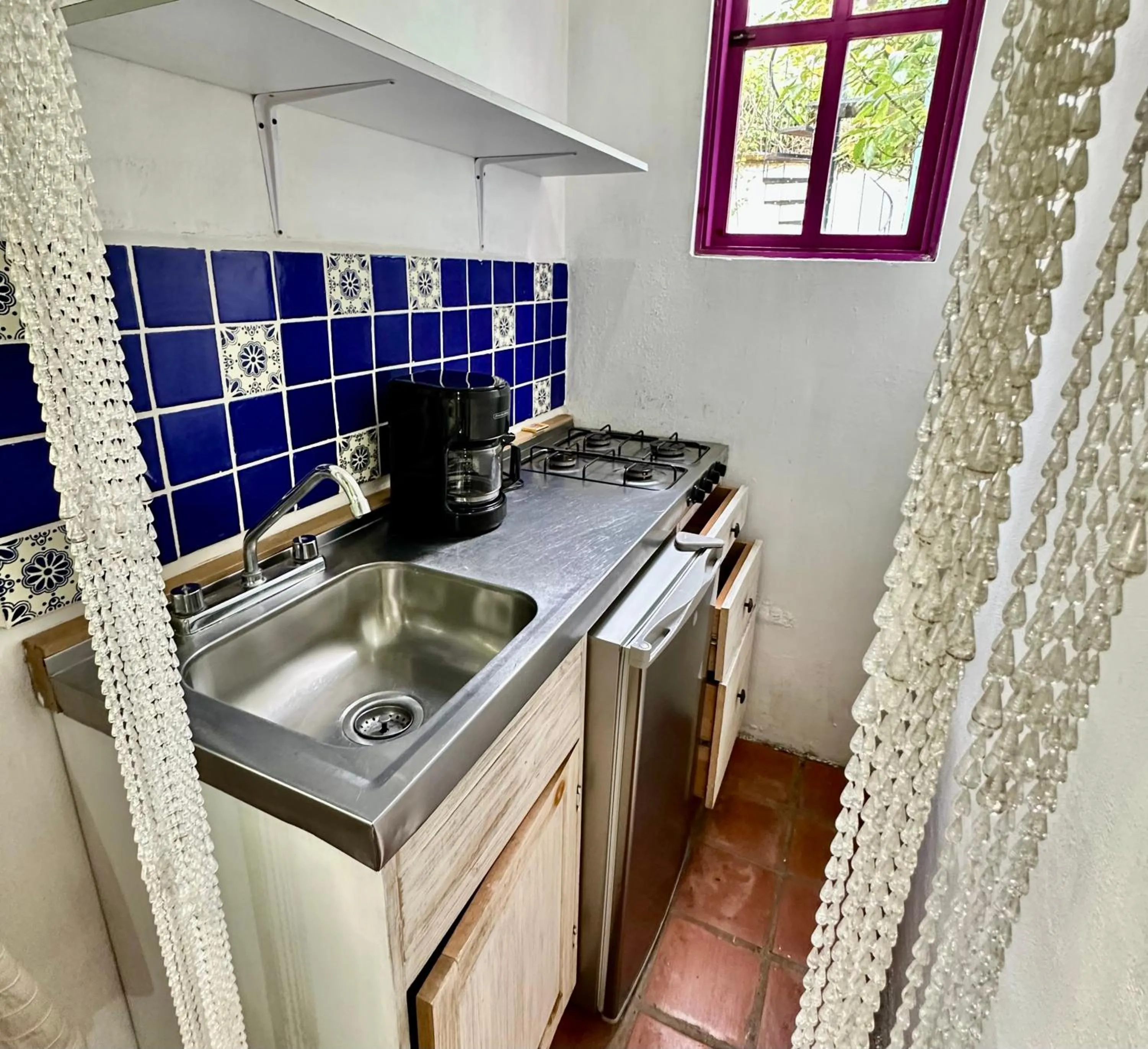 Kitchen or kitchenette in La Etelvina Suites